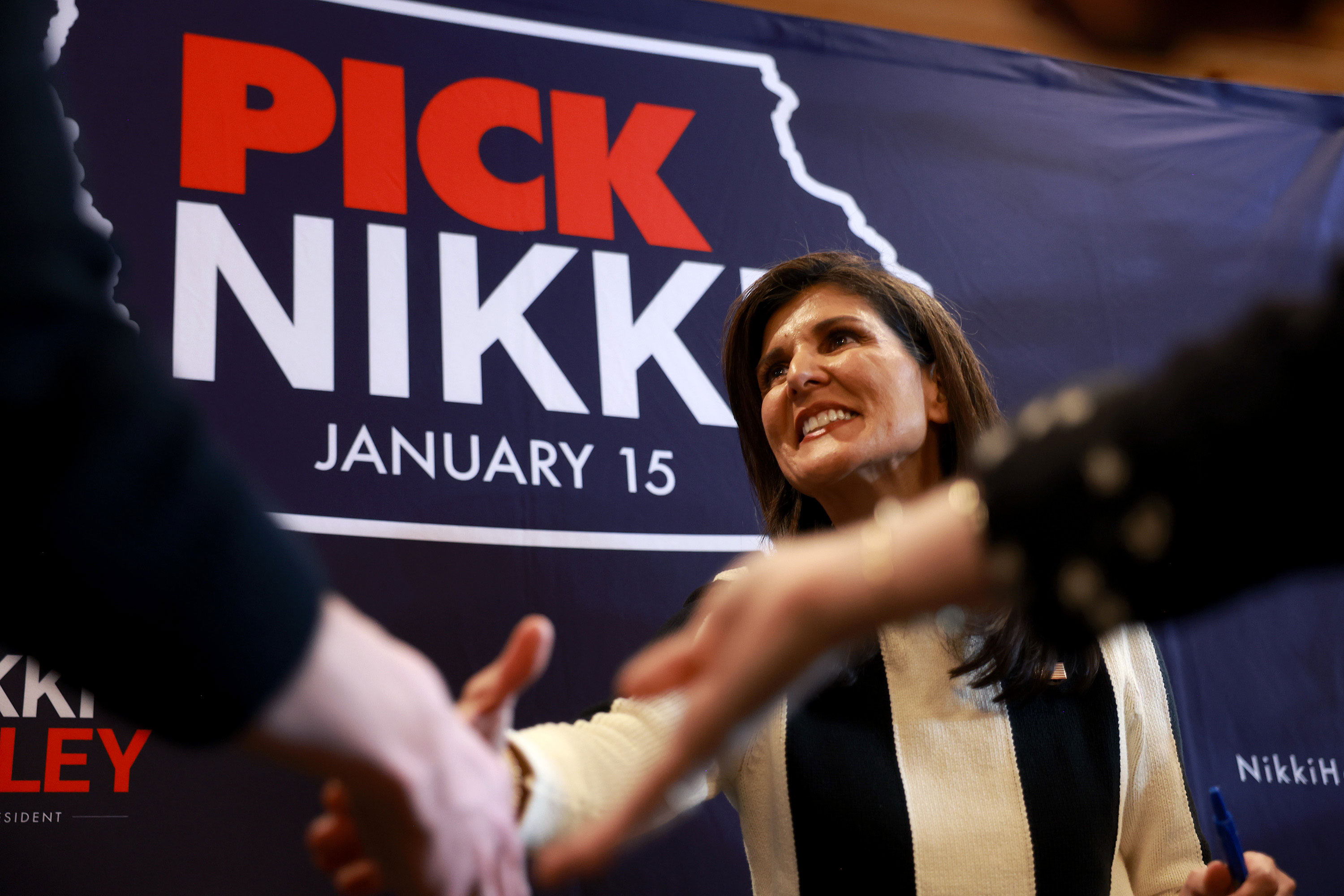 Republican presidential candidate Nikki Haley greets attendees during a campaign event in Adel, Iowa, on Sunday.