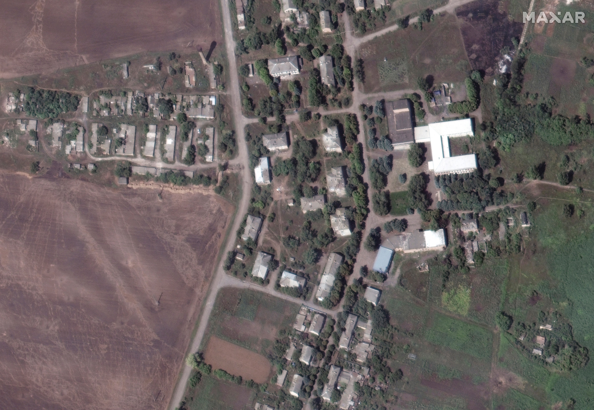 A satellite view shows a school and buildings, in south Soledar, Ukraine, on August 1, 2022.