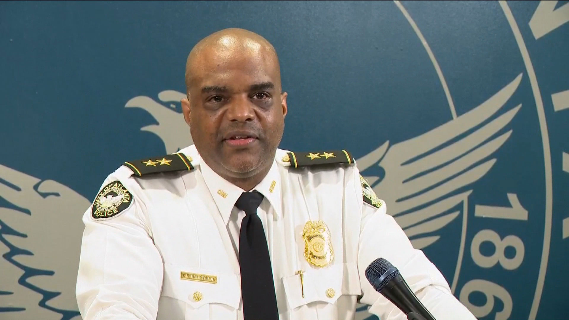 Atlanta Deputy Police Chief Charles Hampton speaks to the media on Thursday.
