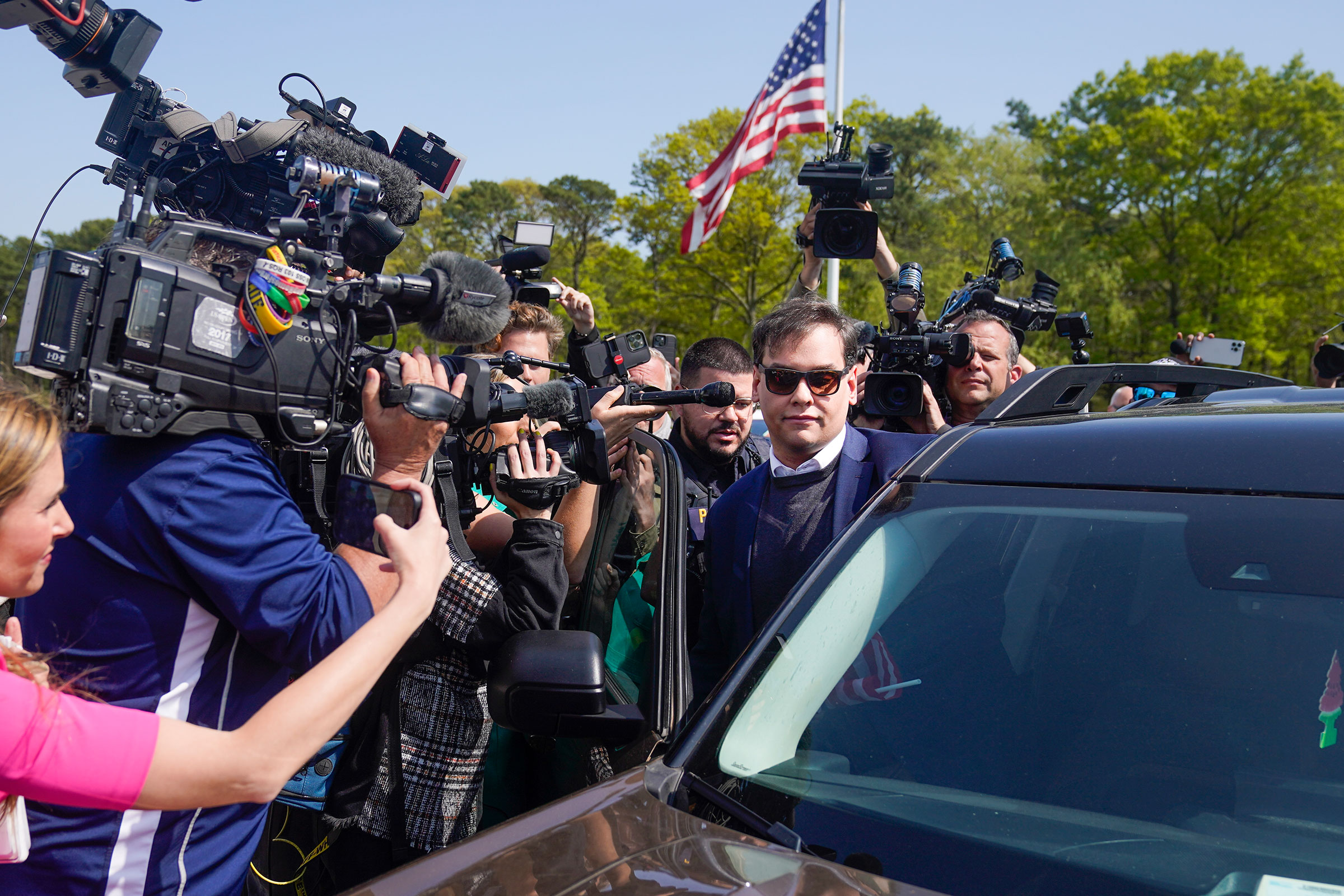 Congressman George Santos gets into his car as he leaves the federal courthouse in Central Islip, New York, on Wednesday, May 10. 