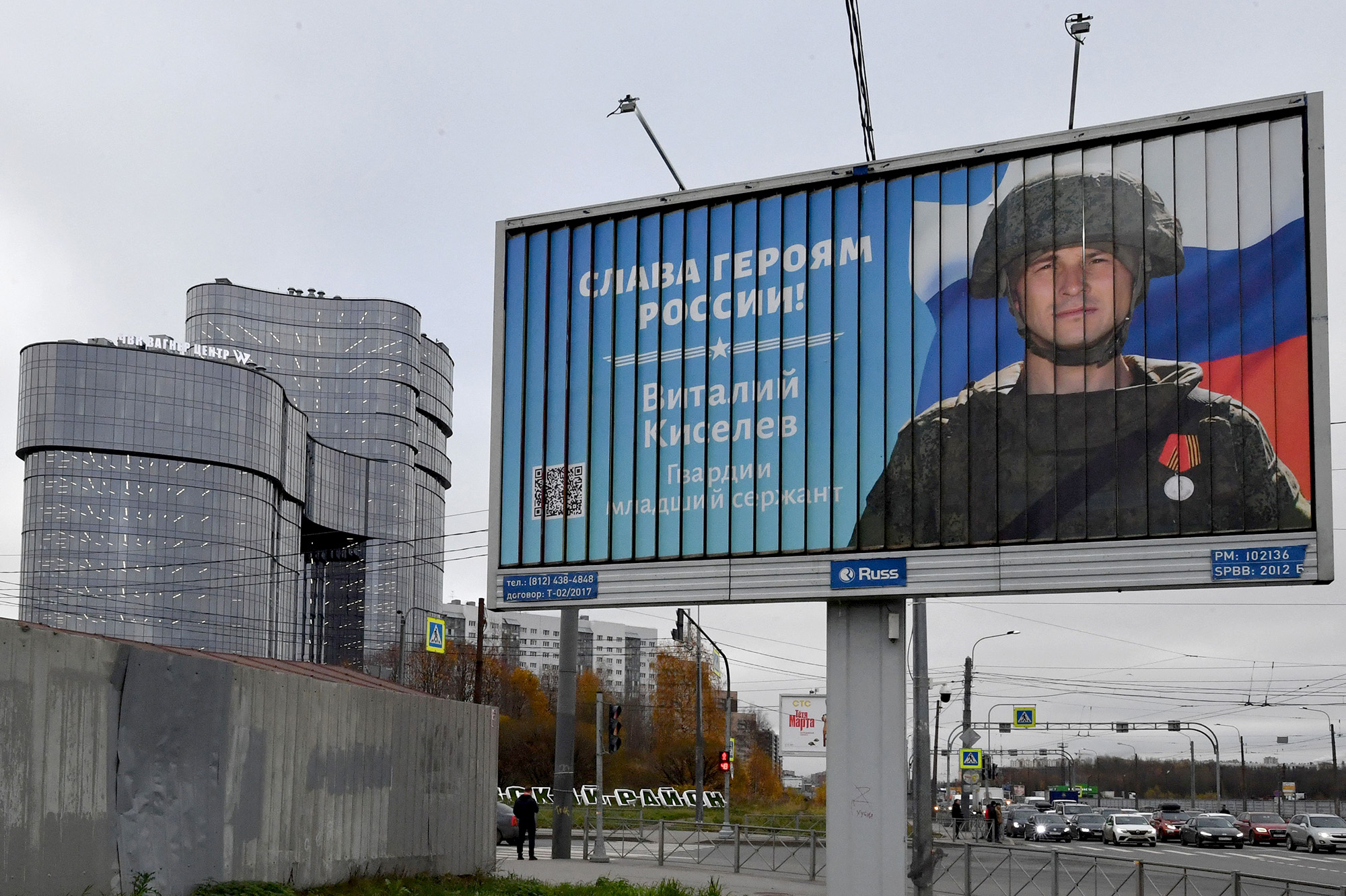 A poster displaying a Russian soldier with a slogan reading 'Glory to the Heroes of Russia' on the street next to the PMC Wagner Centre, in St. Petersburg, Russia, on November 4.
