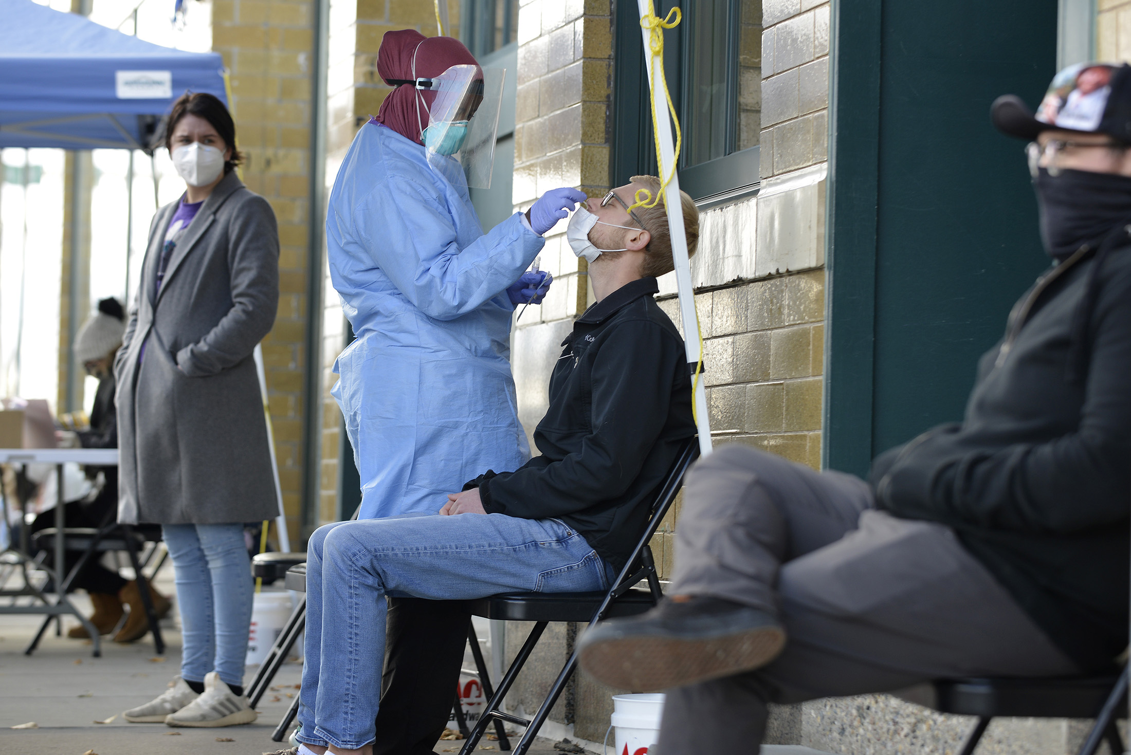 A medical staff member performs a Covid-19 test in Fargo, North Dakota, on Thursday, October 15, 2020. 
