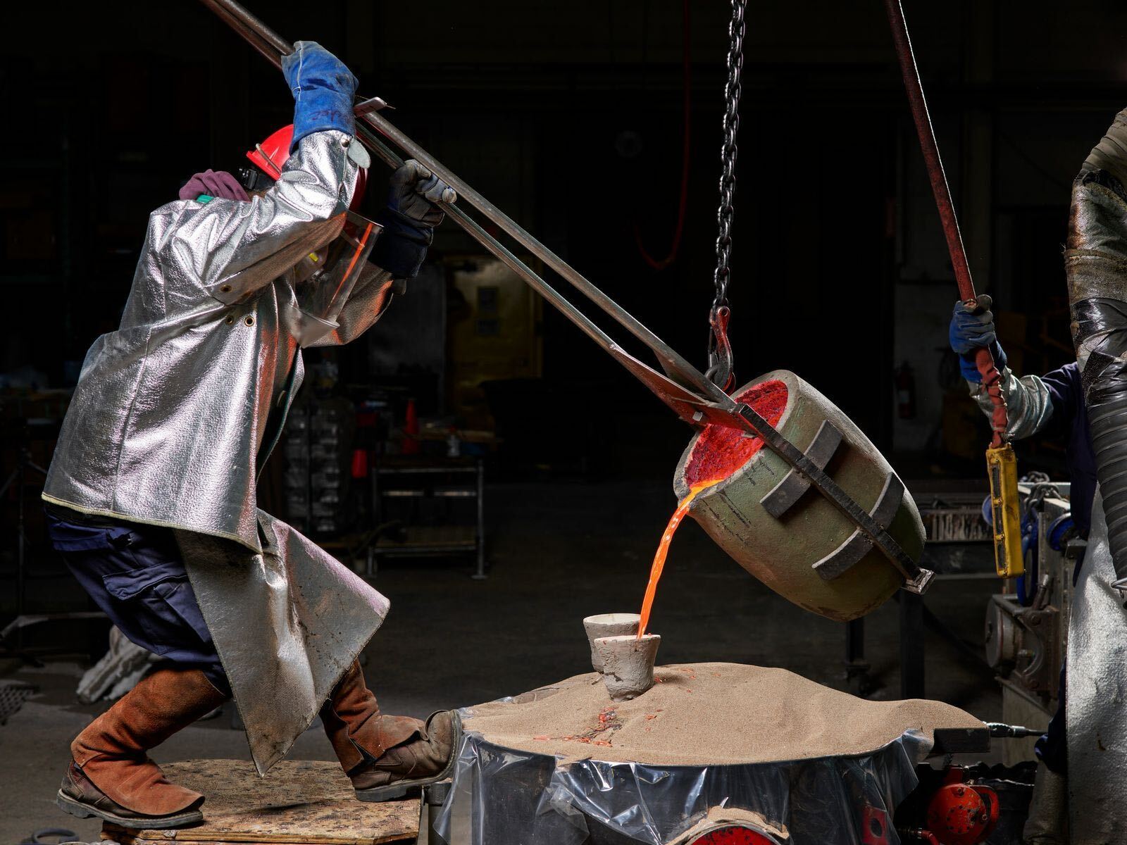 Silicon bronze is poured into a hollow vessel to make Oscar statuettes in Rock Tavern, New York.