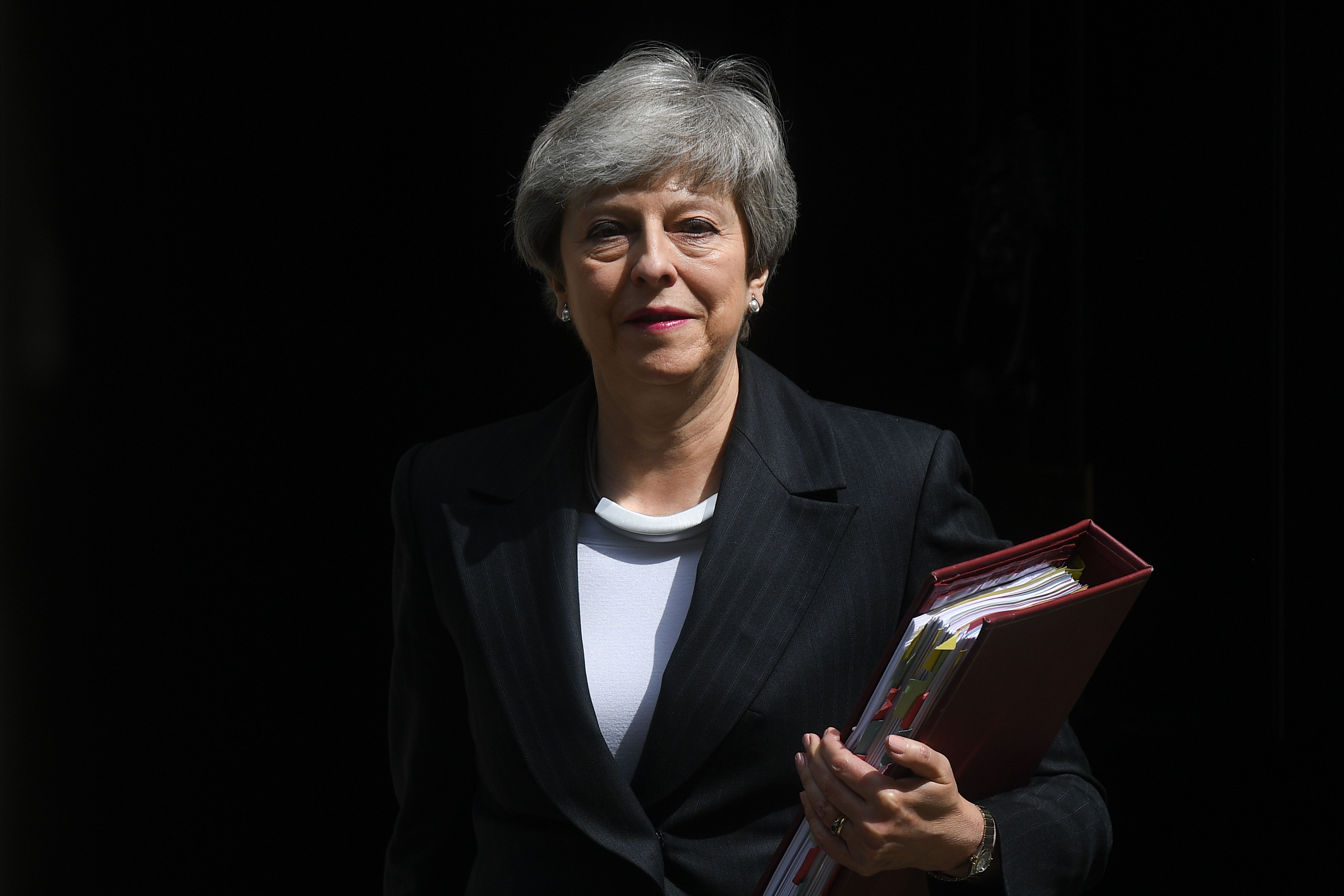 Theresa May leaves Downing Street for Prime Minister's Questions on Wednesday.