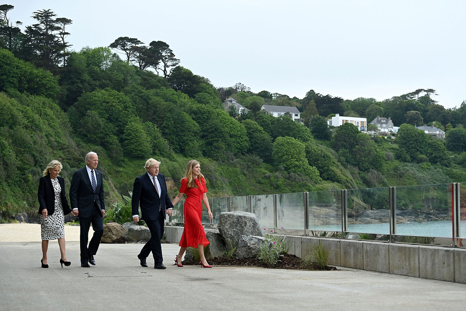 Britain's Prime Minister Boris Johnson, his wife Carrie Johnson and US President Joe Biden with first lady Jill Biden walk outside Carbis Bay, Cornwall, on Thursday, June 10.