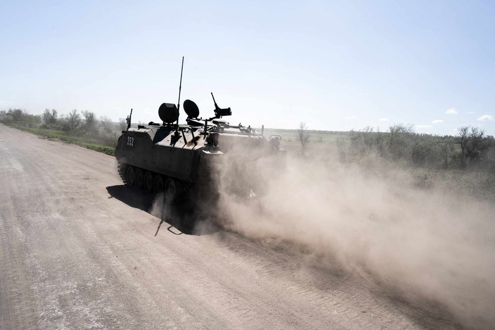 An armored infantry carrier is seen driving to the front line south of Bakhmut on May 17,