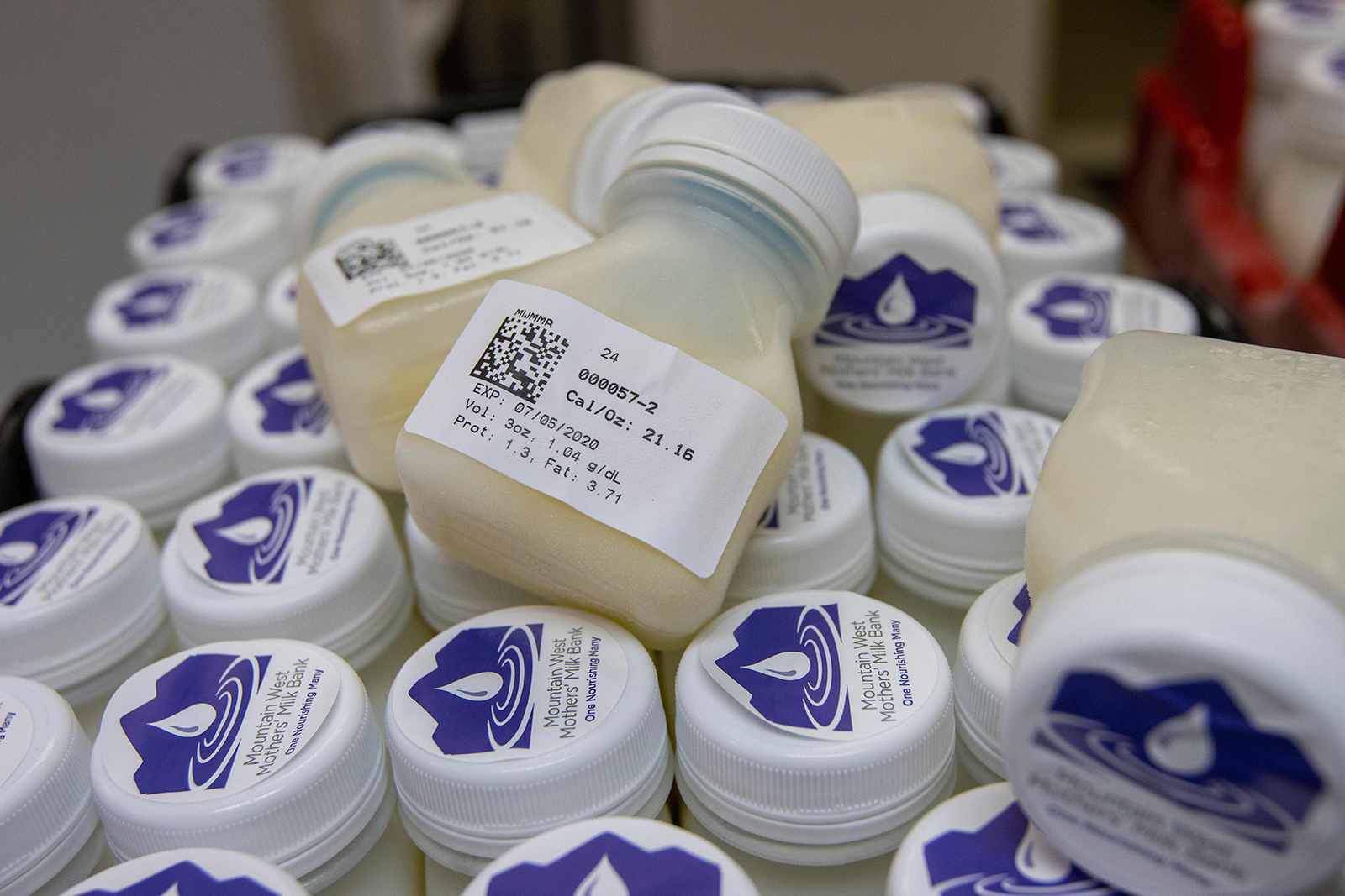 In this December 12, 2019 file photo, a 3-ounce serving of breast milk is ready to be shipped out to nearby hospitals from the Mountain West Mothers Milk Bank in Salt Lake City.