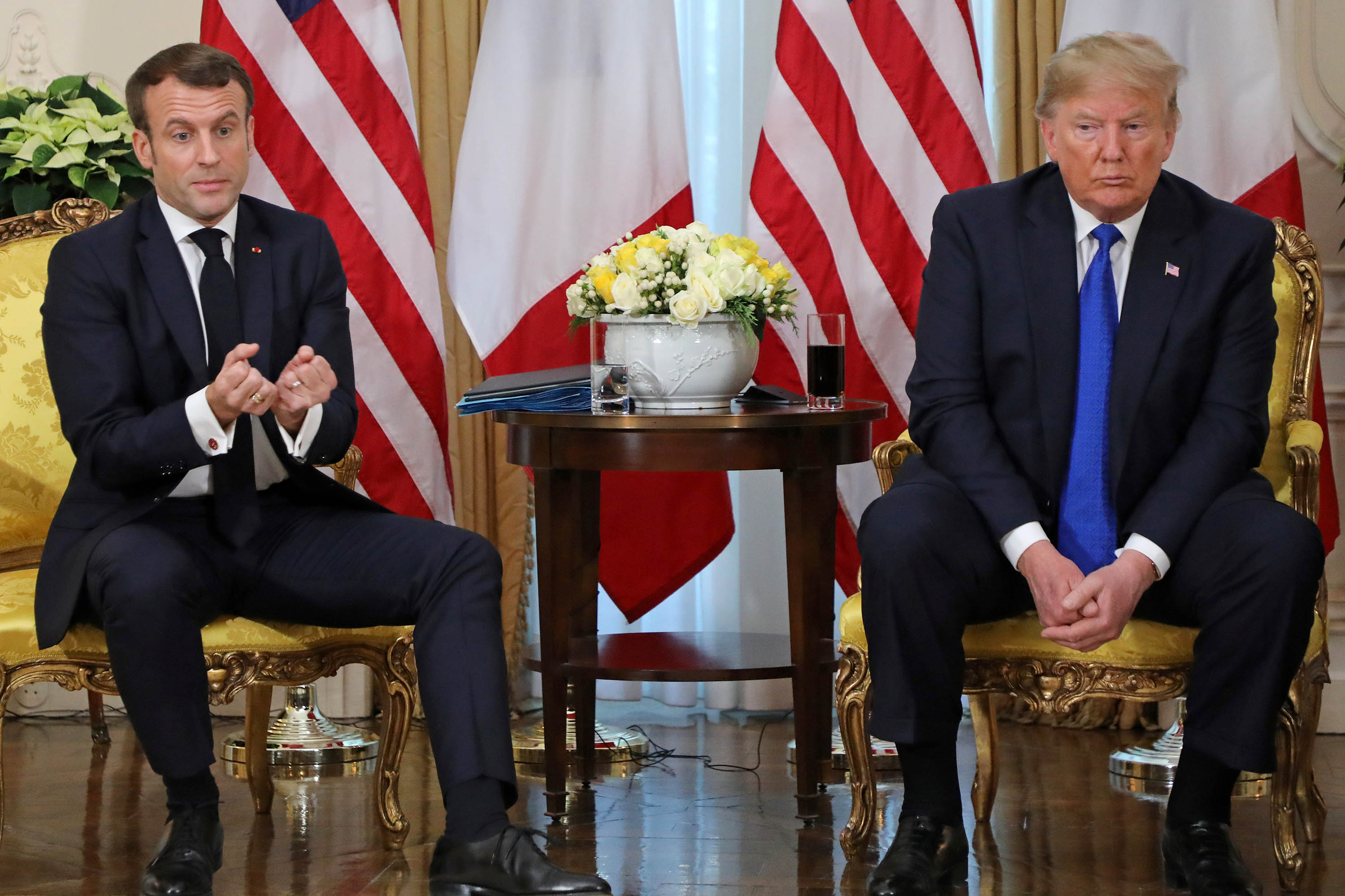 Macron and Trump give a press conference during their meeting at Winfield House in London on Tuesday. 