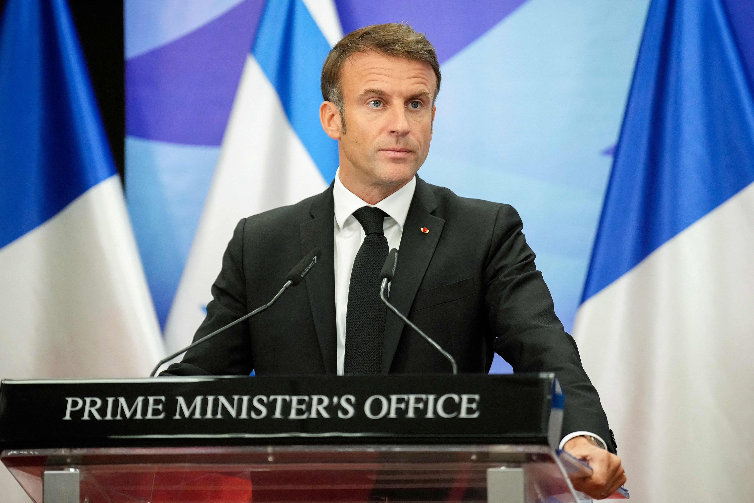 French President Emmanuel Macron addresses the media during a press conference in Jerusalem on October 24. 
