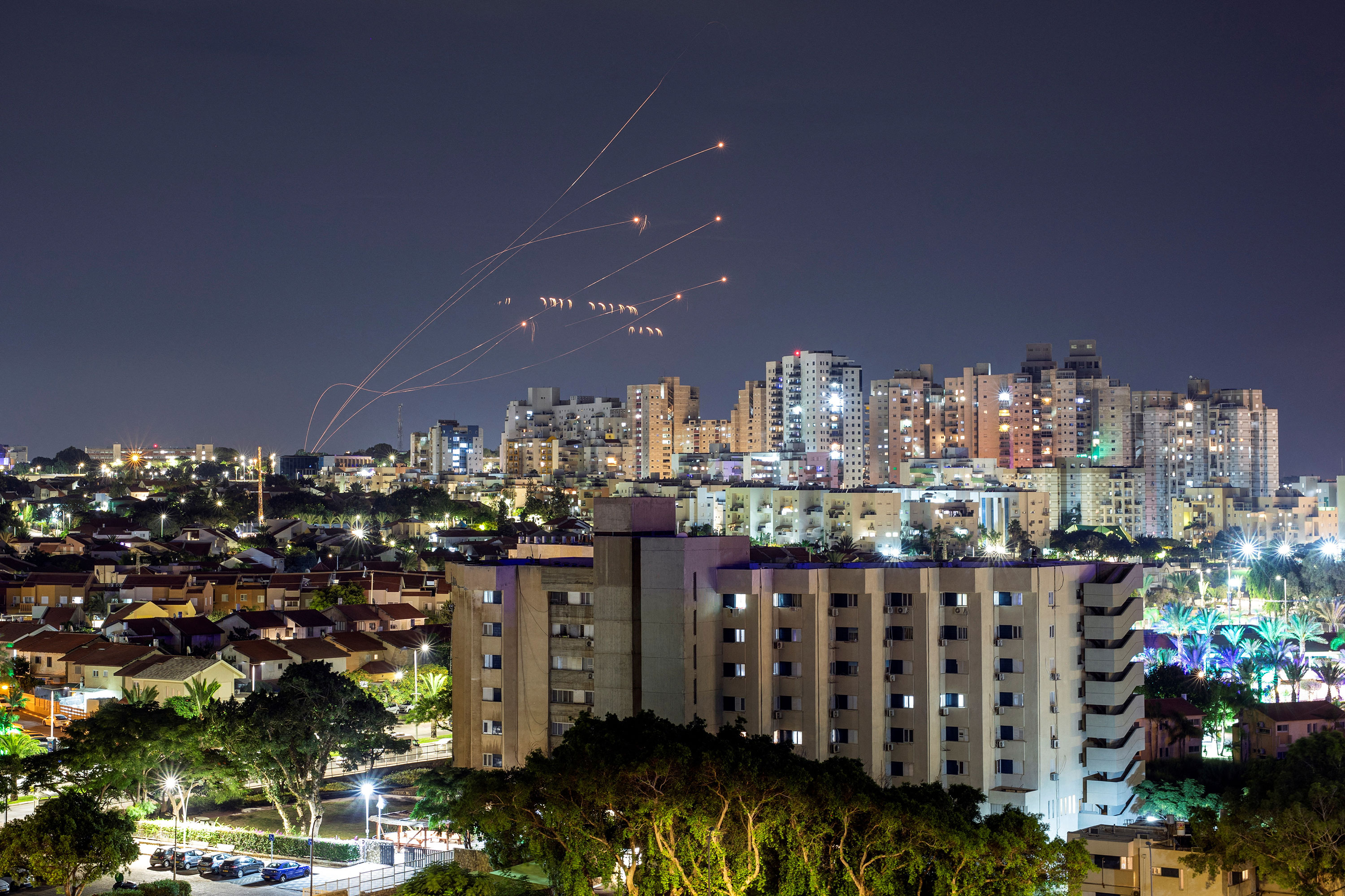 Israel's Iron Dome anti-missile system intercepts rockets launched from Gaza, as seen from Ashkelon in southern Israel, on October 7. 