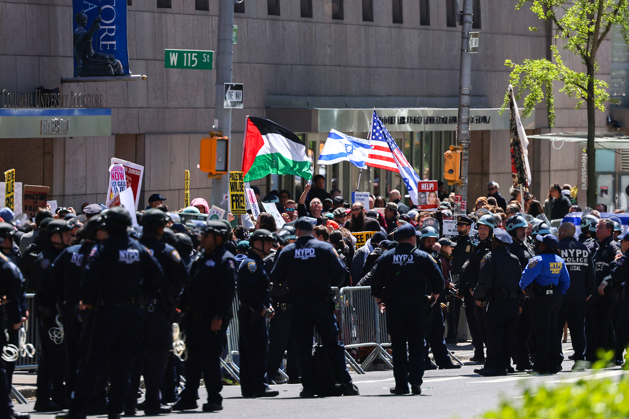 Pro-Palestinian and Pro-israel face off outside of Columbia University which is occupied by Pro-Palestinian protesters in New York on April 22, 2024. 