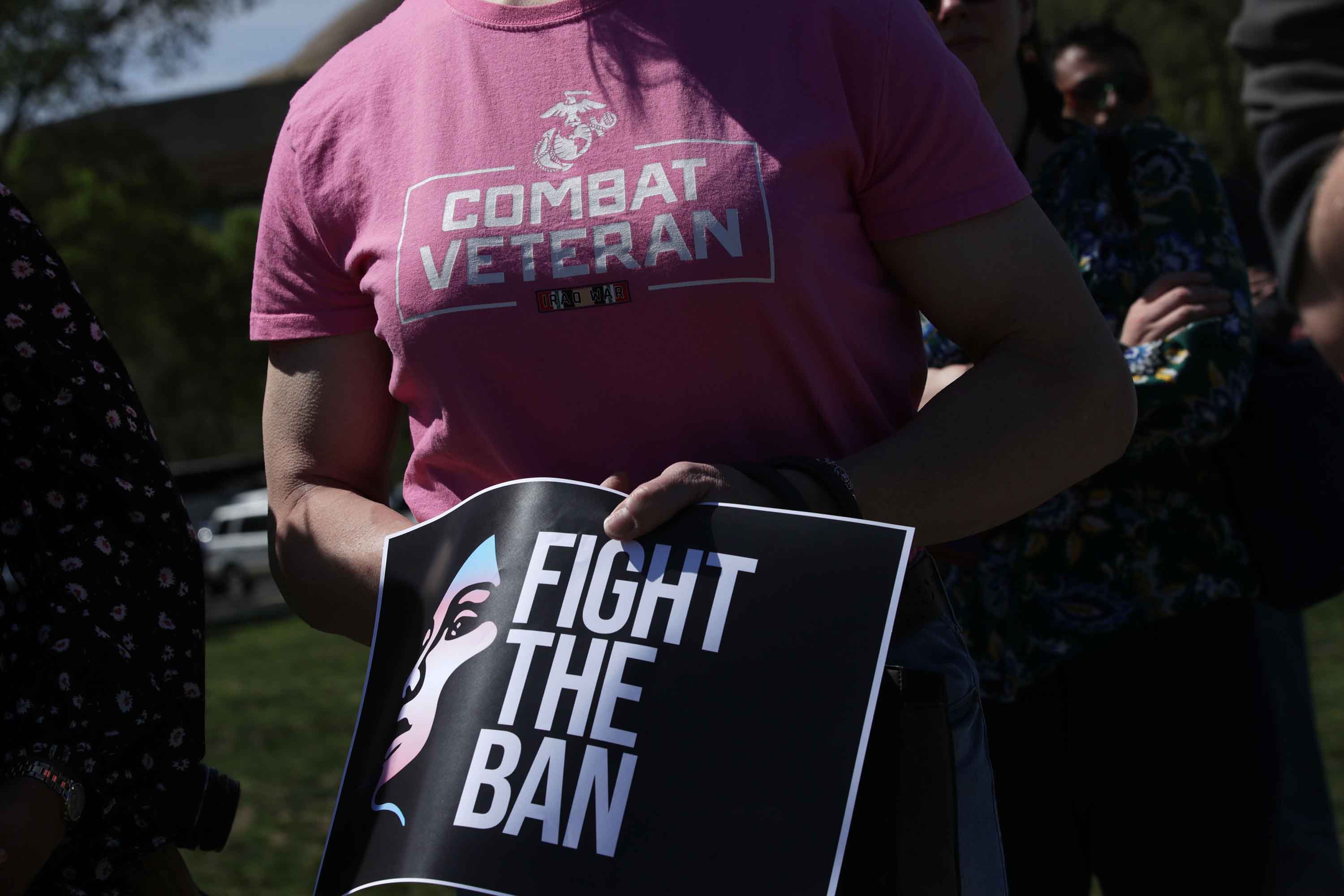 Activists participate in a rally against the Trump administration's transgender military ban in Washington, D.C., on April 10, 2019.