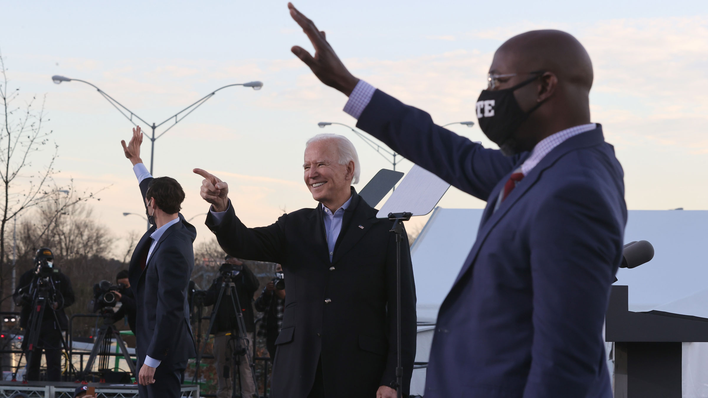 President-elect Joe Biden, center, is joined by Senate candidates Jon Ossoff, left, and Raphael Warnock during a campaign rally in Atlanta on Monday.