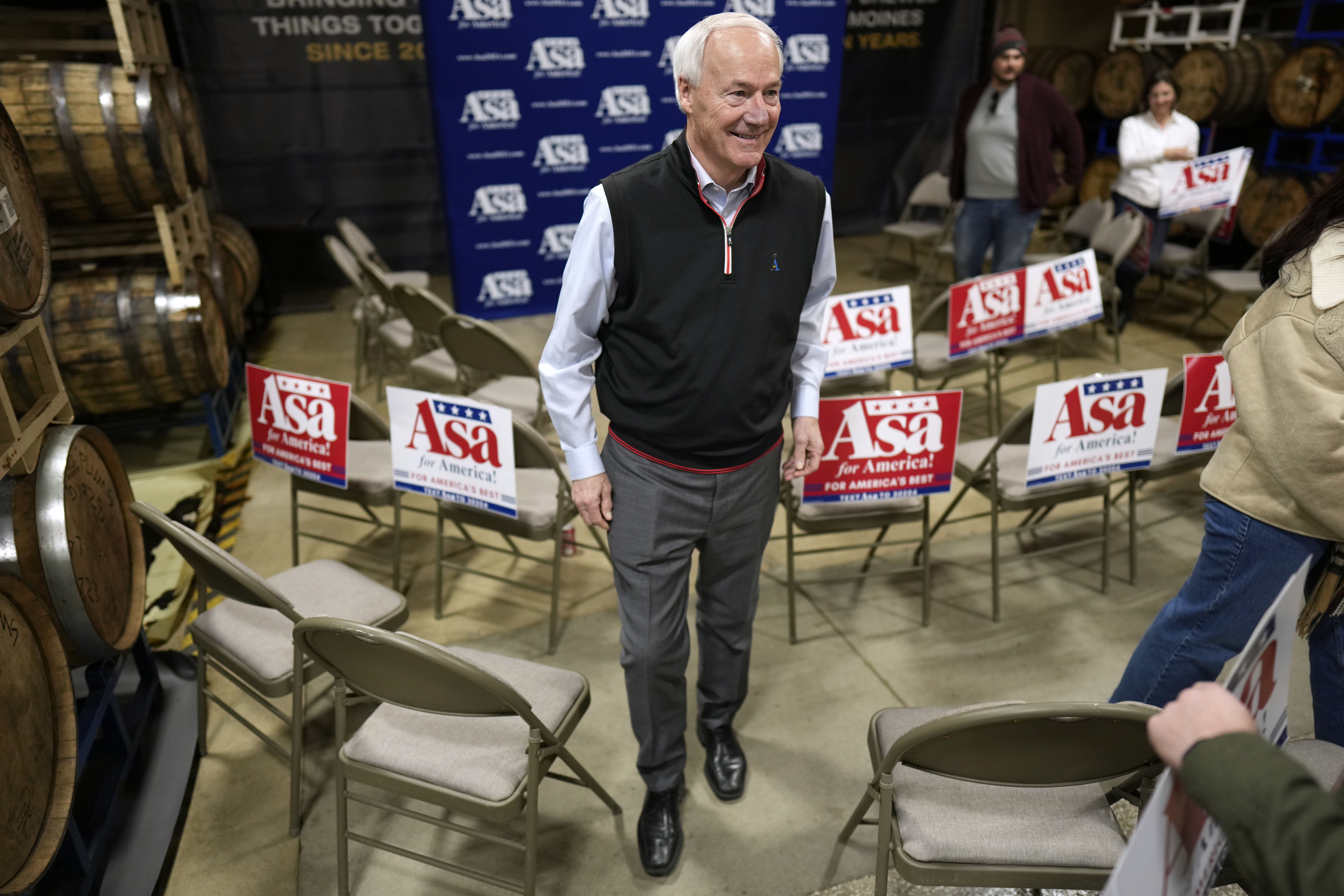 Former Arkansas Gov. Asa Hutchinson leaves a presidential campaign event in Des Moines, Iowa, on January 3.
