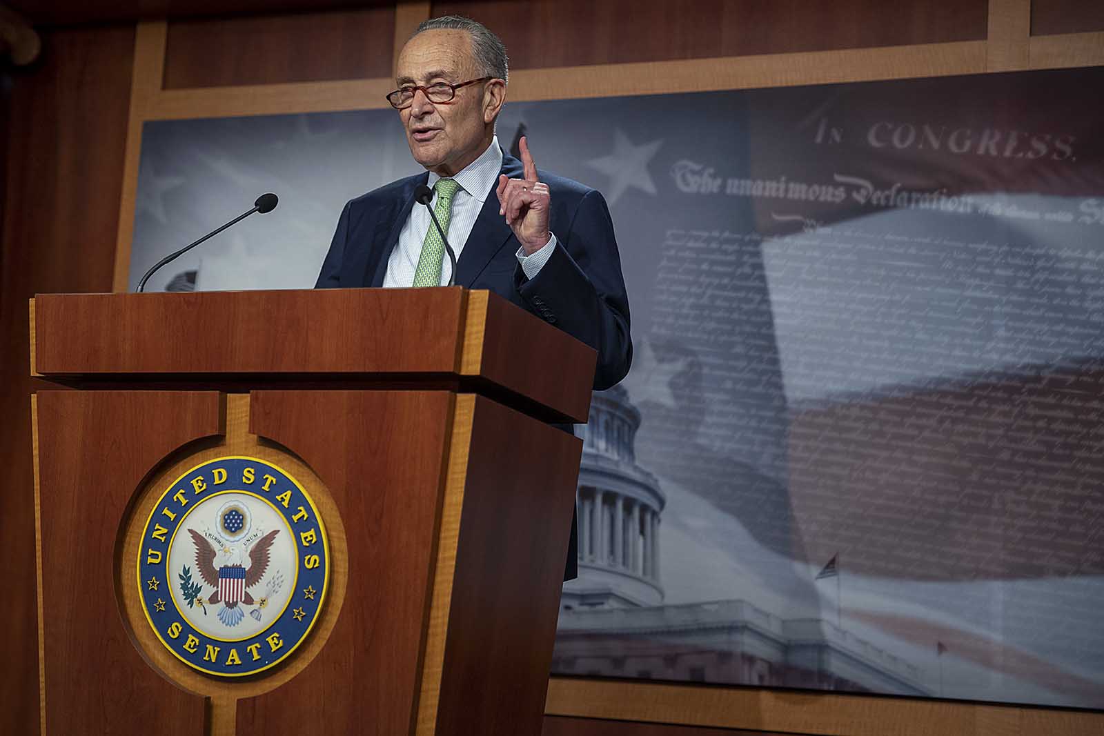 Senate Minority Leader Sen. Chuck Schumer speaks at a news conference on October 1, in Washington.