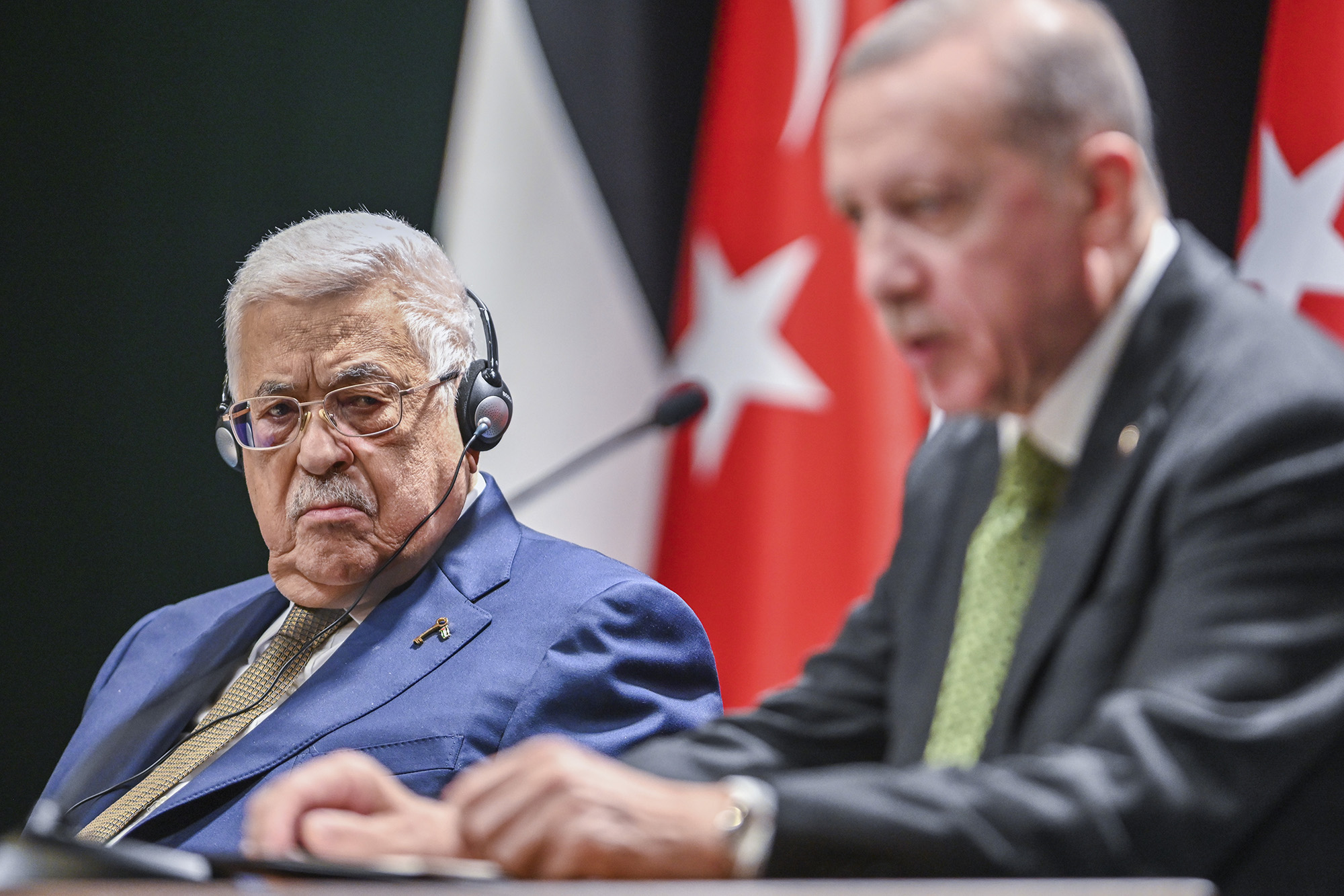 Palestinian President Mahmoud Abbas, left, looks at Turkish President Recep Tayyip Erdogan as he speaks to the media during a joint press conference at the Presidential palace in Ankara, Turkey, on March 5.