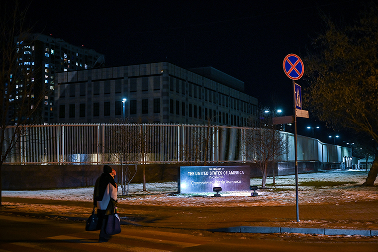 A woman passes by the closed US embassy in Kyiv after operations were moved to Lviv, on February 14.