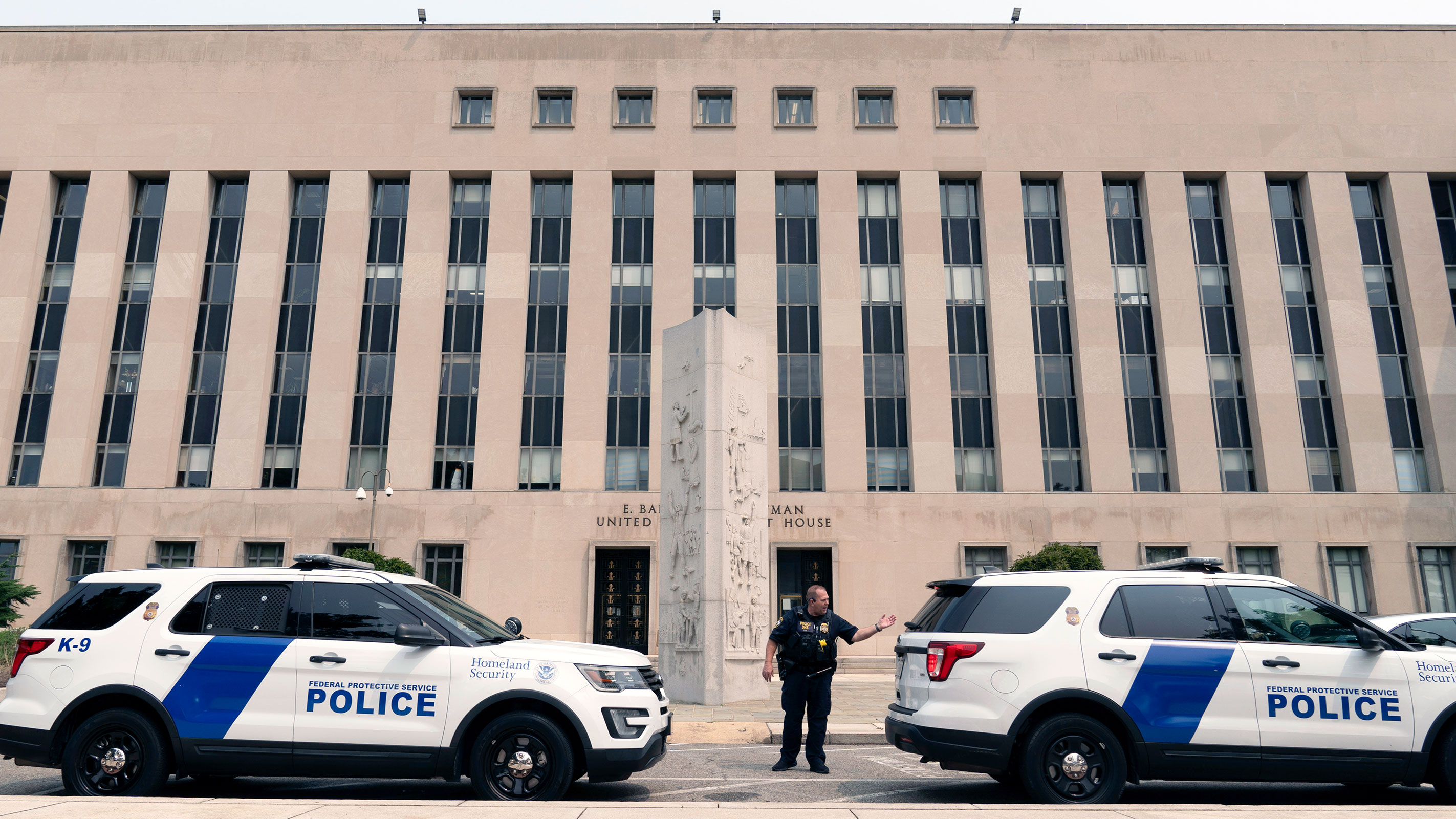 Homeland Security police officers park their patrol cars outside the Federal District Court, Tuesday, Aug. 1, 2023 in Washington, where a grand jury has been meeting in the probe led by special counsel Jack Smith into former President Donald Trump.  