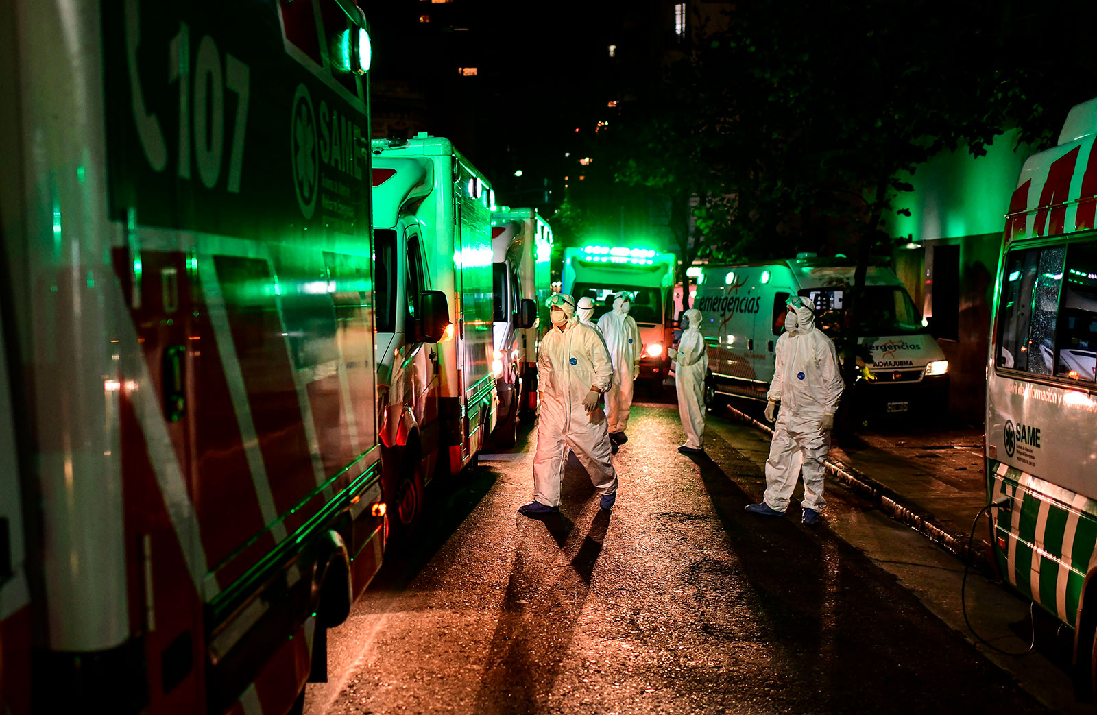 Healthcare workers stand next to ambulances in Buenos Aires, Argentina, on May 7.