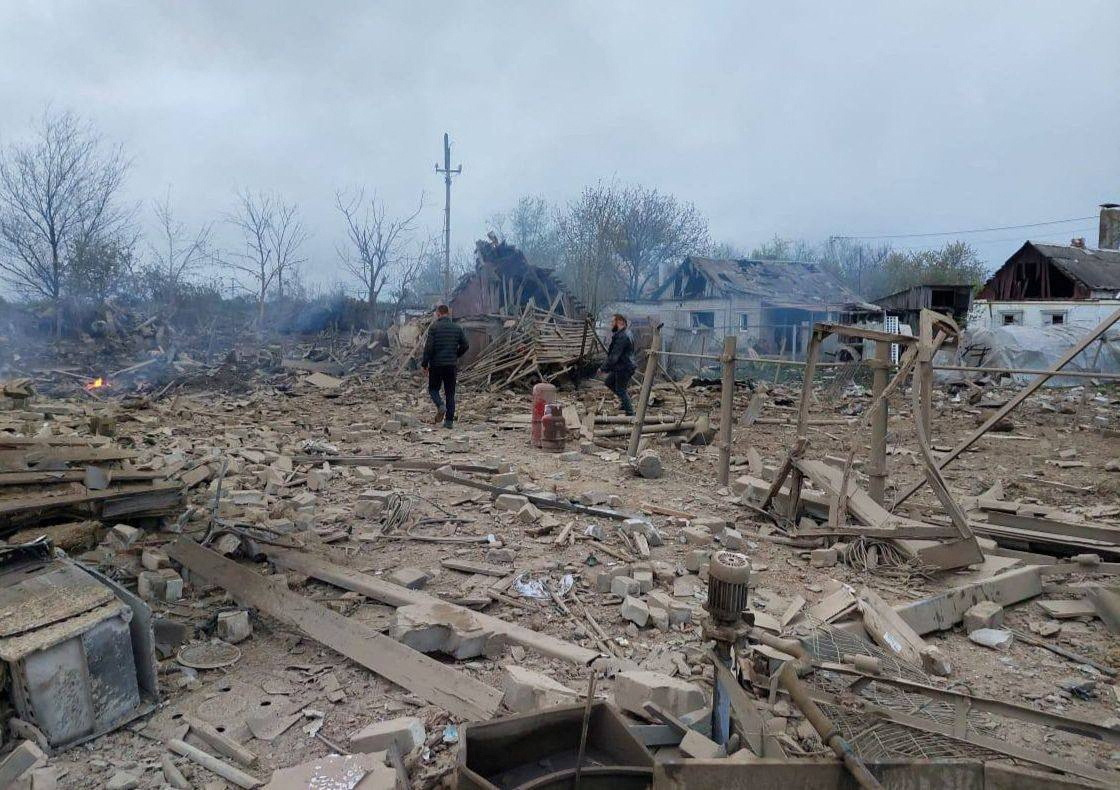 People are seen at the site of a residential area hit by a Russian military strike in the town of Pavlohrad, Dnipropetrovsk region, Ukraine, on May 1.