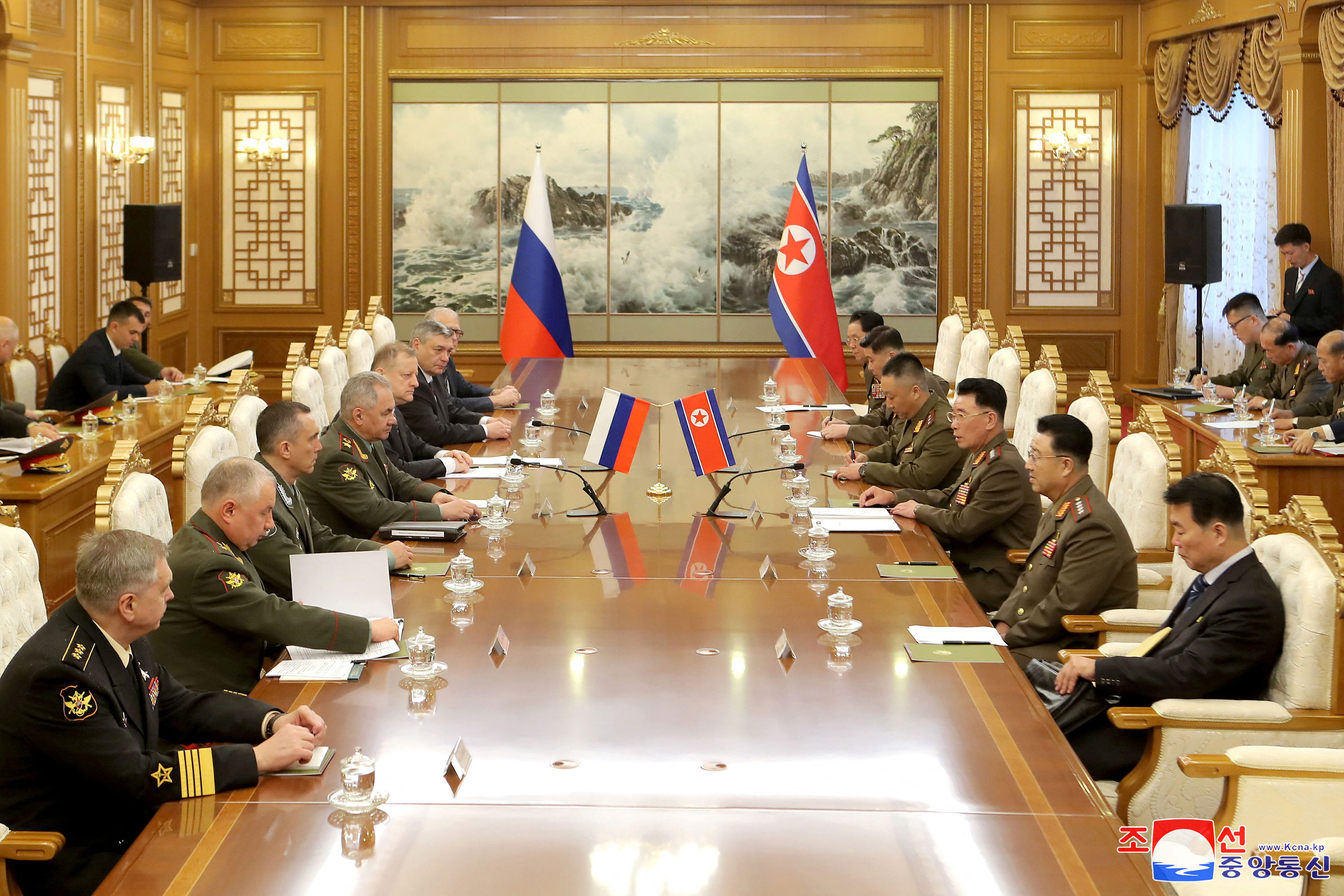 North Korean Defence Minister Kang Sun Nam meets with Russian Defense Minister Sergei Shoigu in this image released by North Korea's Korean Central News Agency on July 27. 