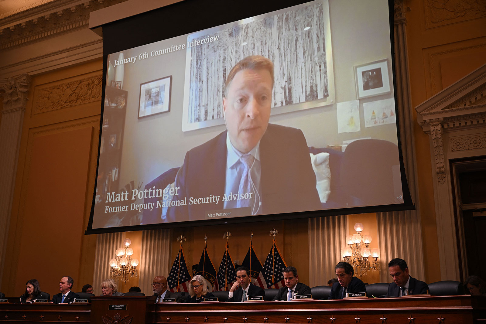 Video deposition of Matt Pottinger is played during the House select committee hearing on June 28.