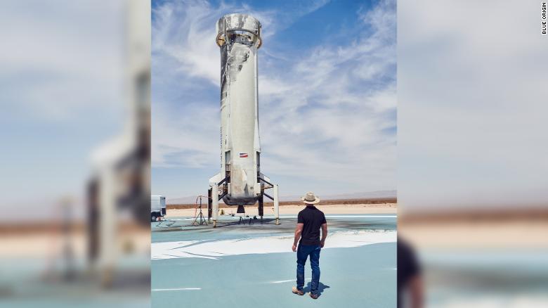 Jeff Bezos inspecting the booster on the landing pad after a NS-15 flight and landing test.