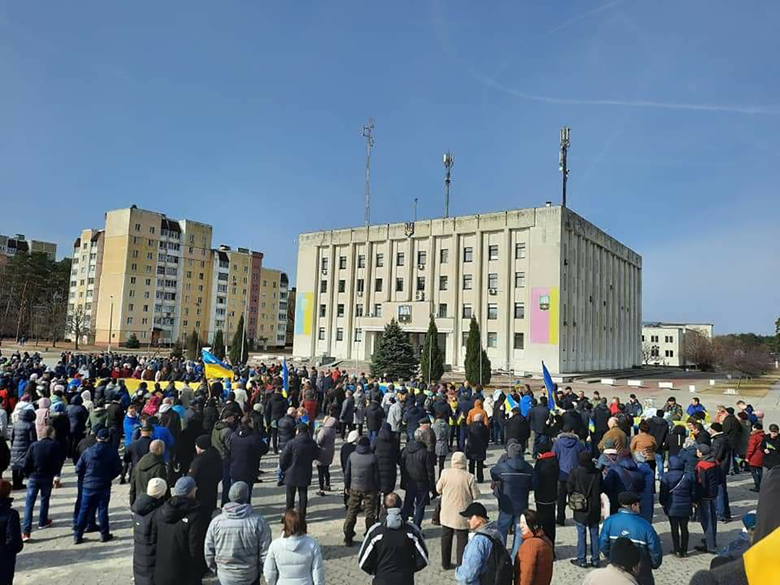 People gather for a protest in Slavutych, Ukraine, on Saturday, March 26. 