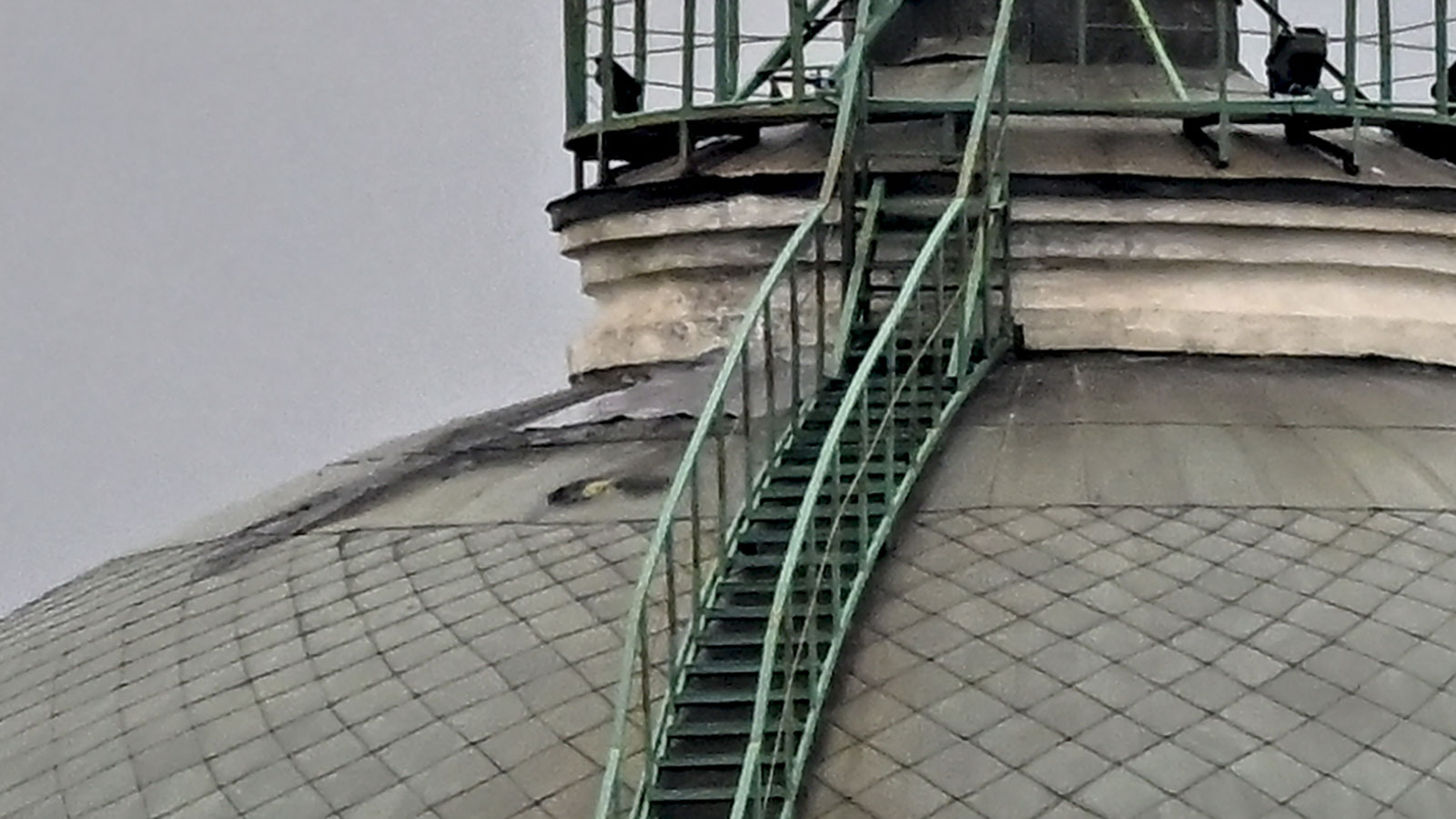 A portion of the dome appears to be damaged.