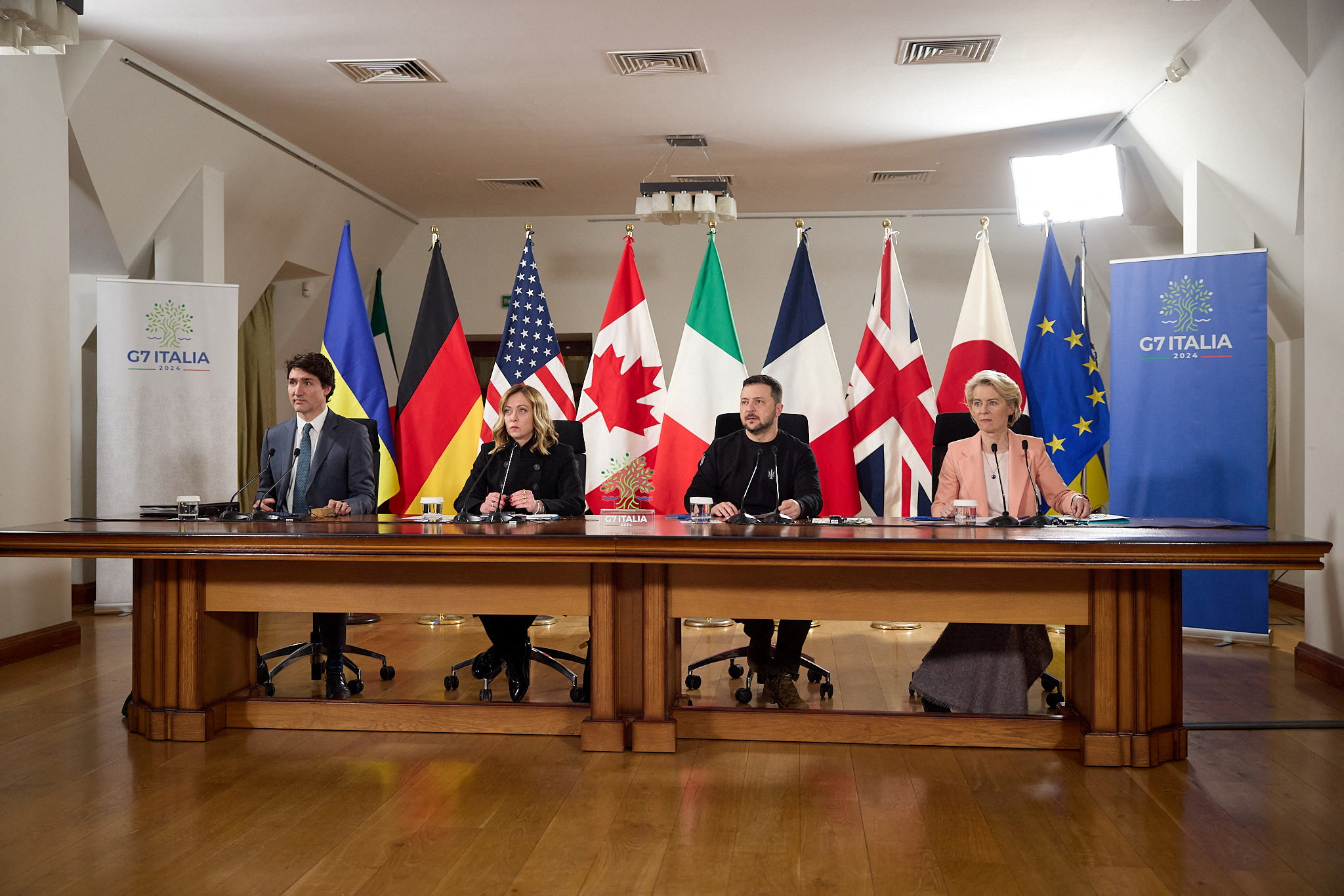Canadian Prime Minister Justin Trudeau, left, Italian Prime Minister Giorgia Meloni, Ukrainian President Volodymyr Zelensky and European Commission President Ursula von der Leyen attend a video conference with G7 leaders in Kyiv, Ukraine, on February 24.