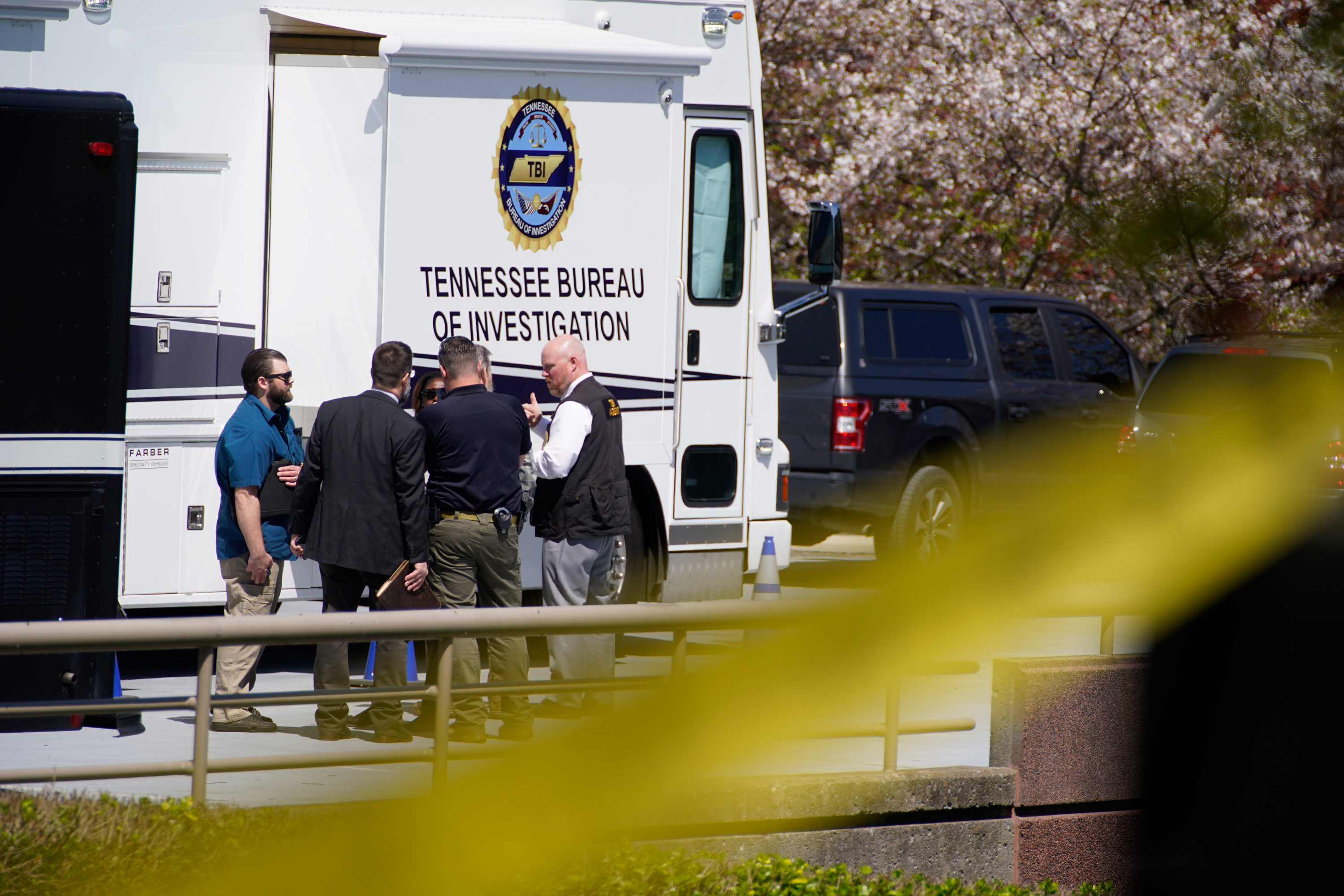 Metro Nashville Police officers gather near The Covenant School, in Nashville, Tennessee on Monday.