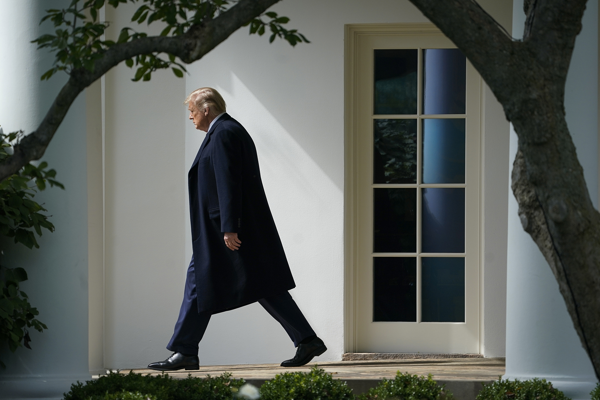 US President Donald Trump exits the Oval Office and walks to Marine One on the South Lawn of the White House on October 1, in Washington. 