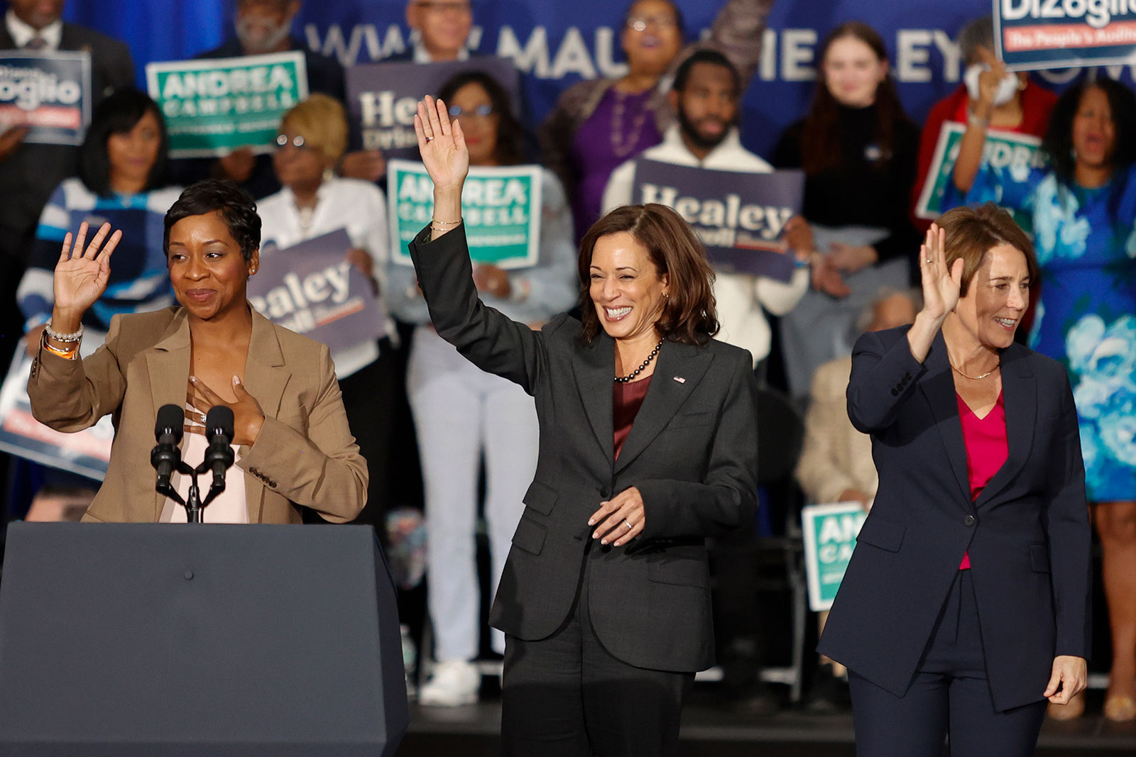 Vice President Kamala Harris, center, is joined on the stage by Massachusetts Attorney General nominee Andrea Campbell, left, and Attorney General and Democratic candidate for Gov. Maura Healey during a campaign rally on November 2, in Boston. 