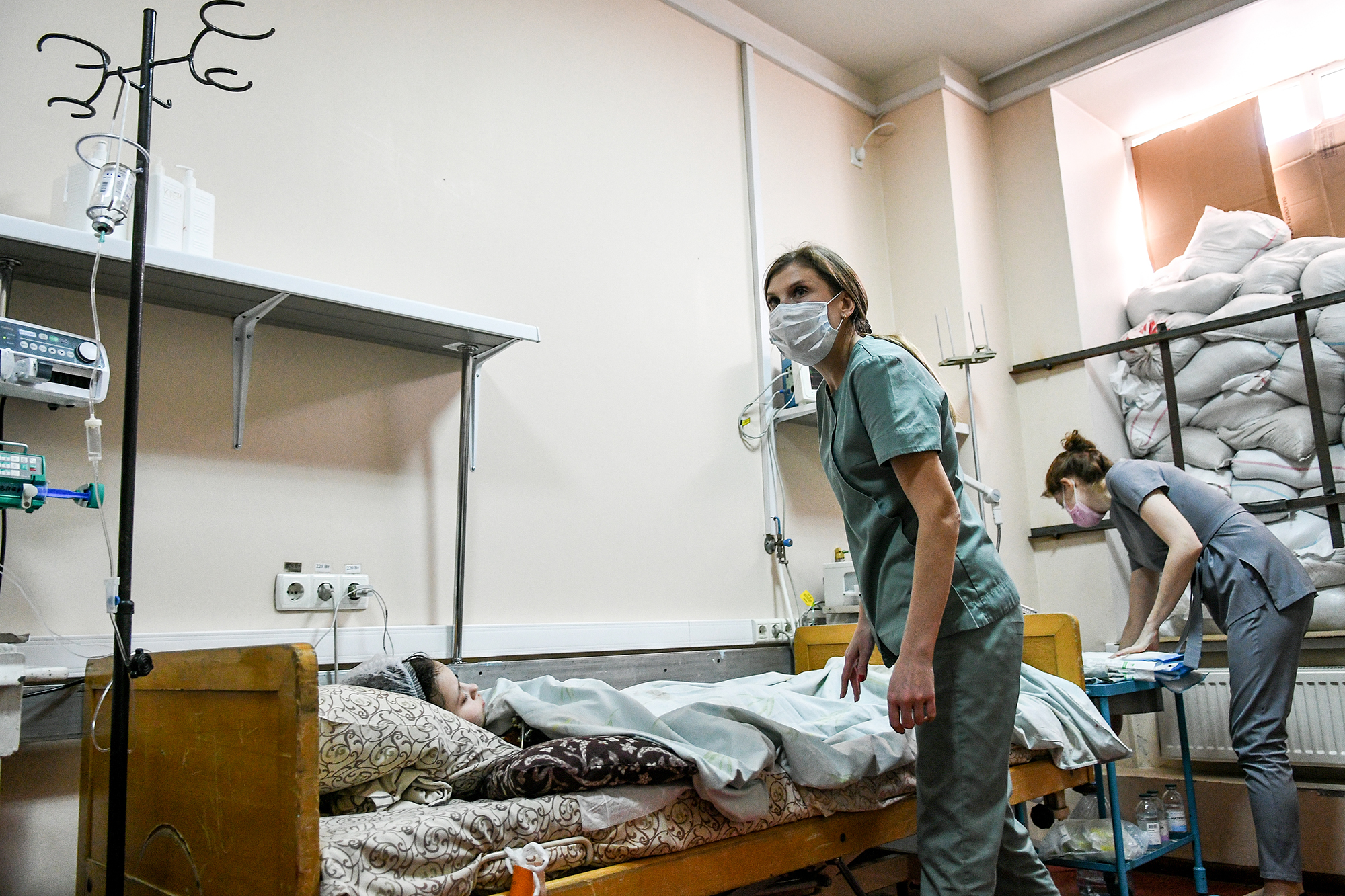 A girl injured in the conflict receives treatment at a regional children's hospital in Zaporizhzhia, Ukraine, on March 22.