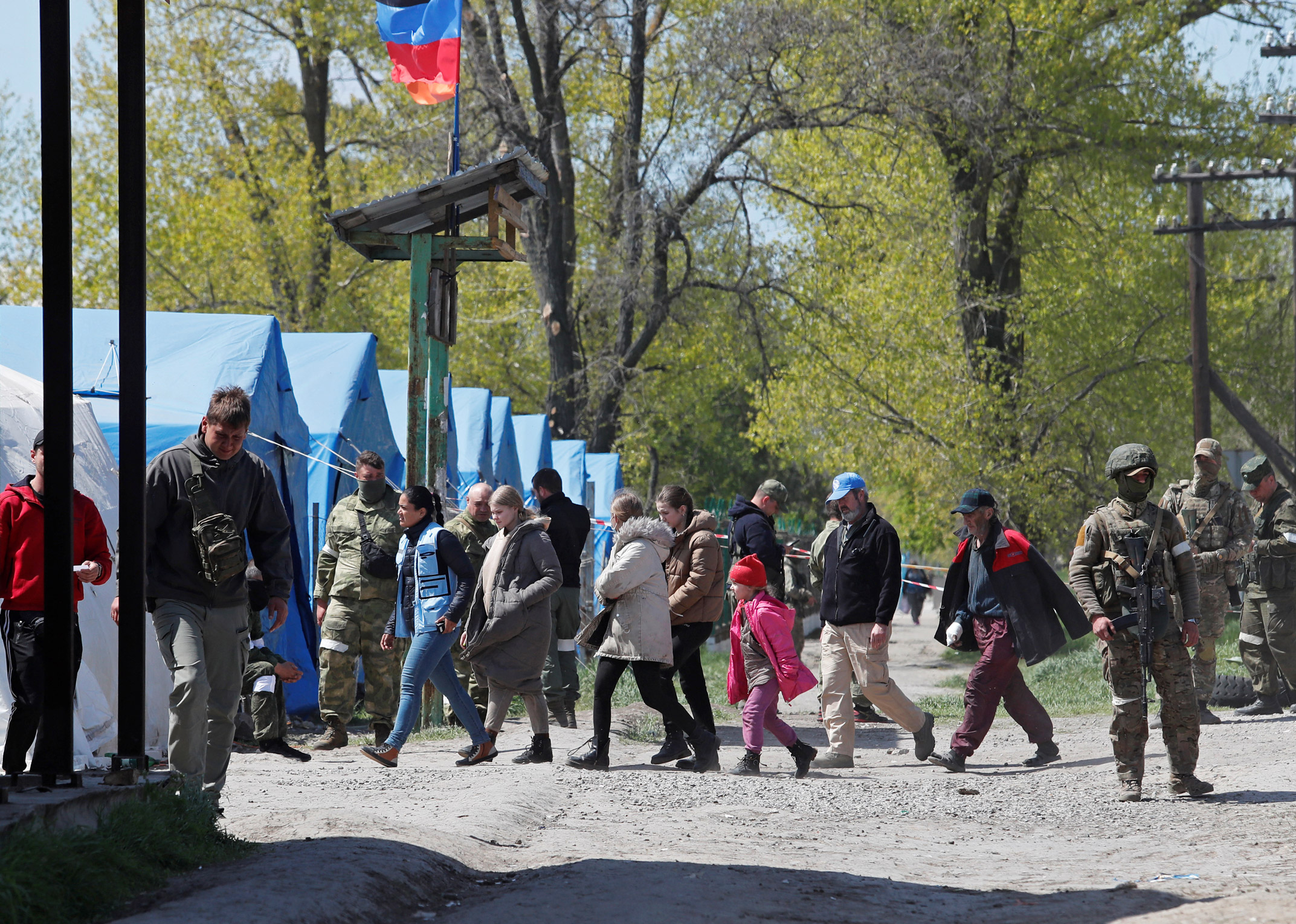 Civilians evacuated from Mariupol arrive at the Russian filtration camp in Bezimenne in eastern Ukraine on May 1.
