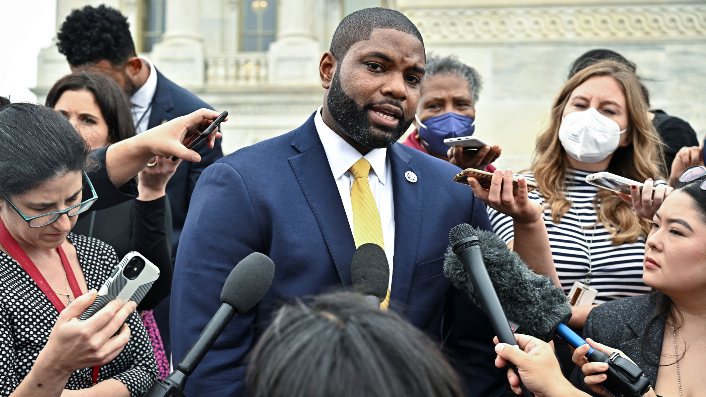 US Rep. Byron Donalds speaks to reporters on the steps of the Capitol on Wednesday.