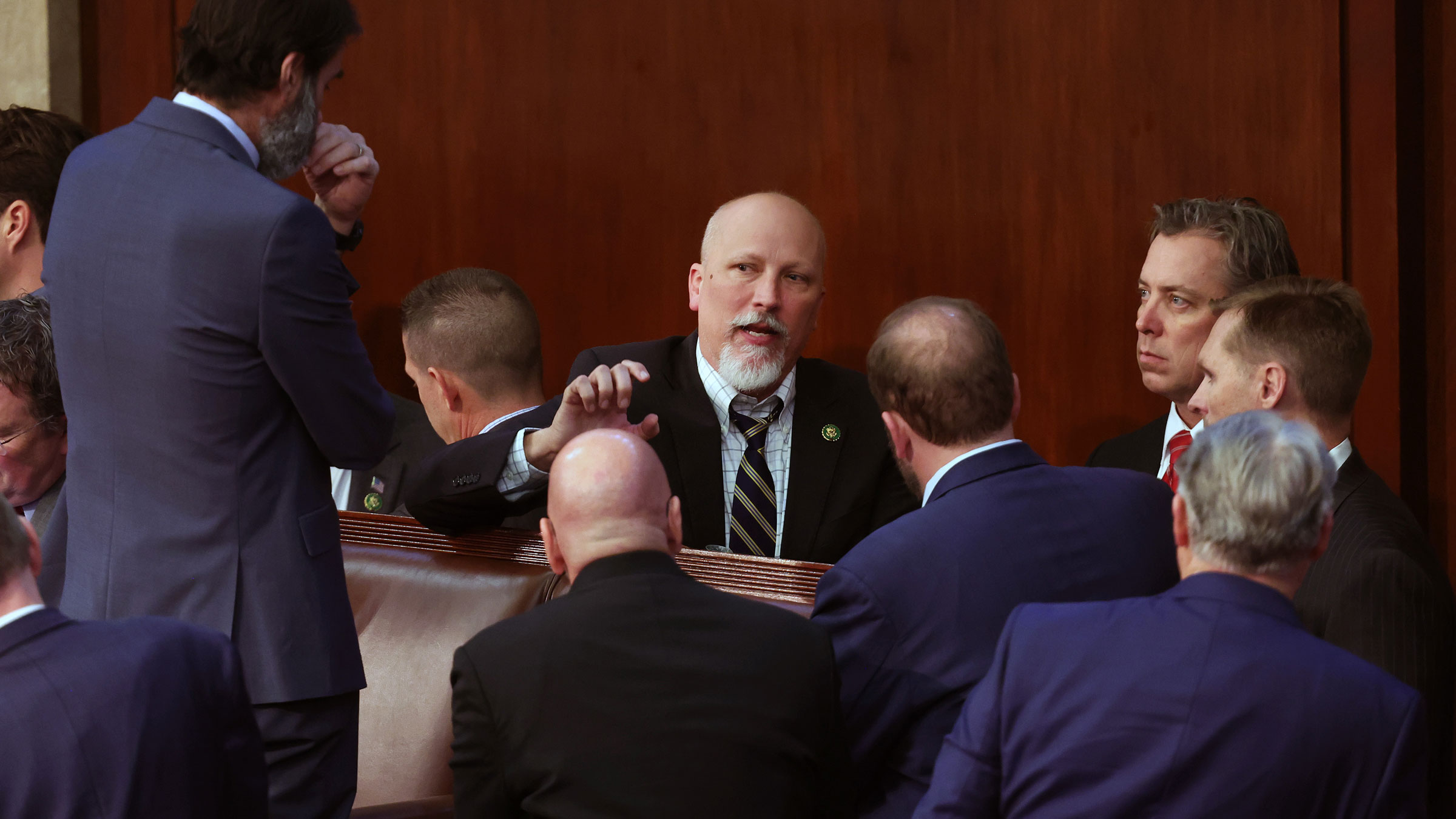 US Rep. Chip Roy, center, talks to others successful  the House enclosure  connected  Wednesday.