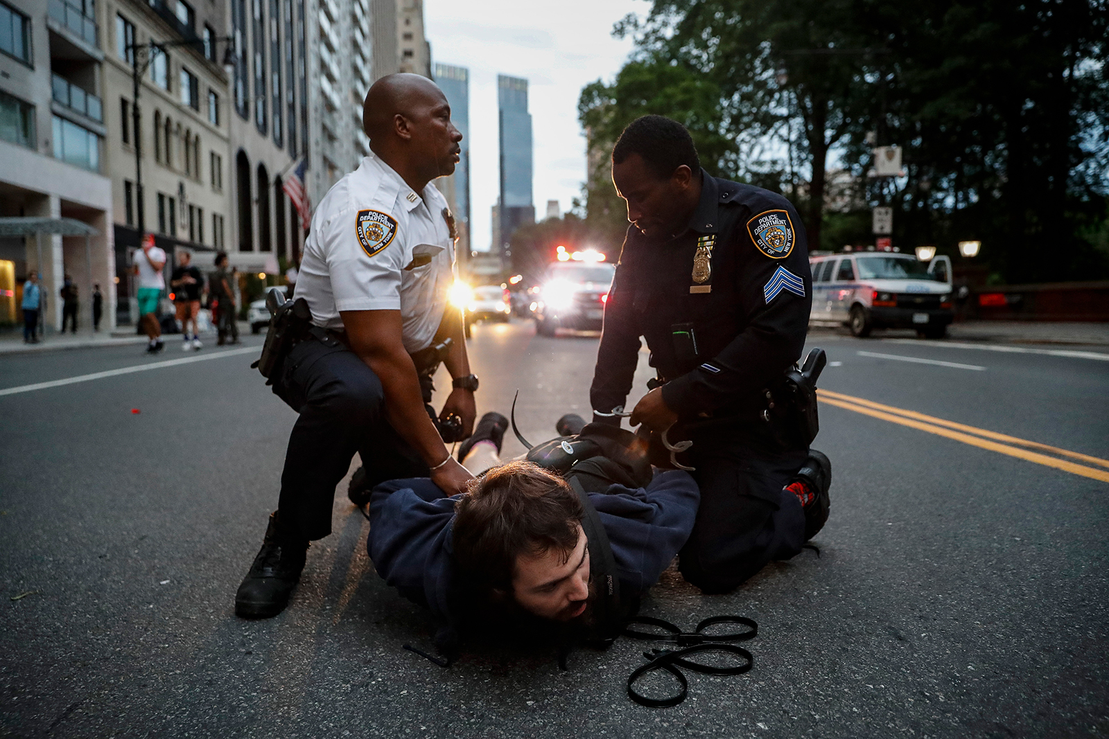 A protester is arrested for violating curfew near the Plaza Hotel on June 3, in the Manhattan borough of New York. 