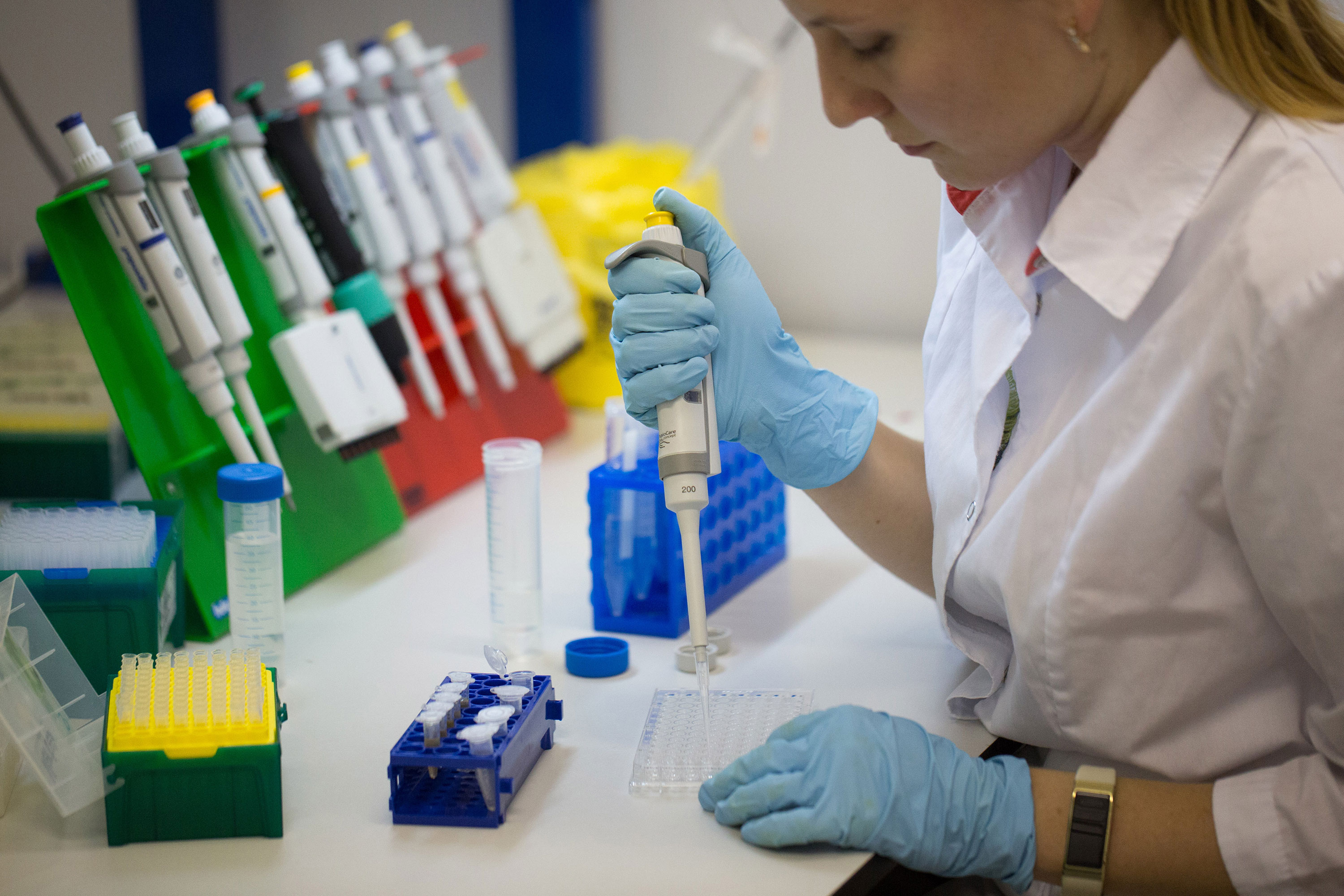 A lab technician works on production of the 'Medgamal' Covid-19 vaccine, developed by the Gamaleya National Research Center for Epidemiology on August 6 in Moscow, Russia.