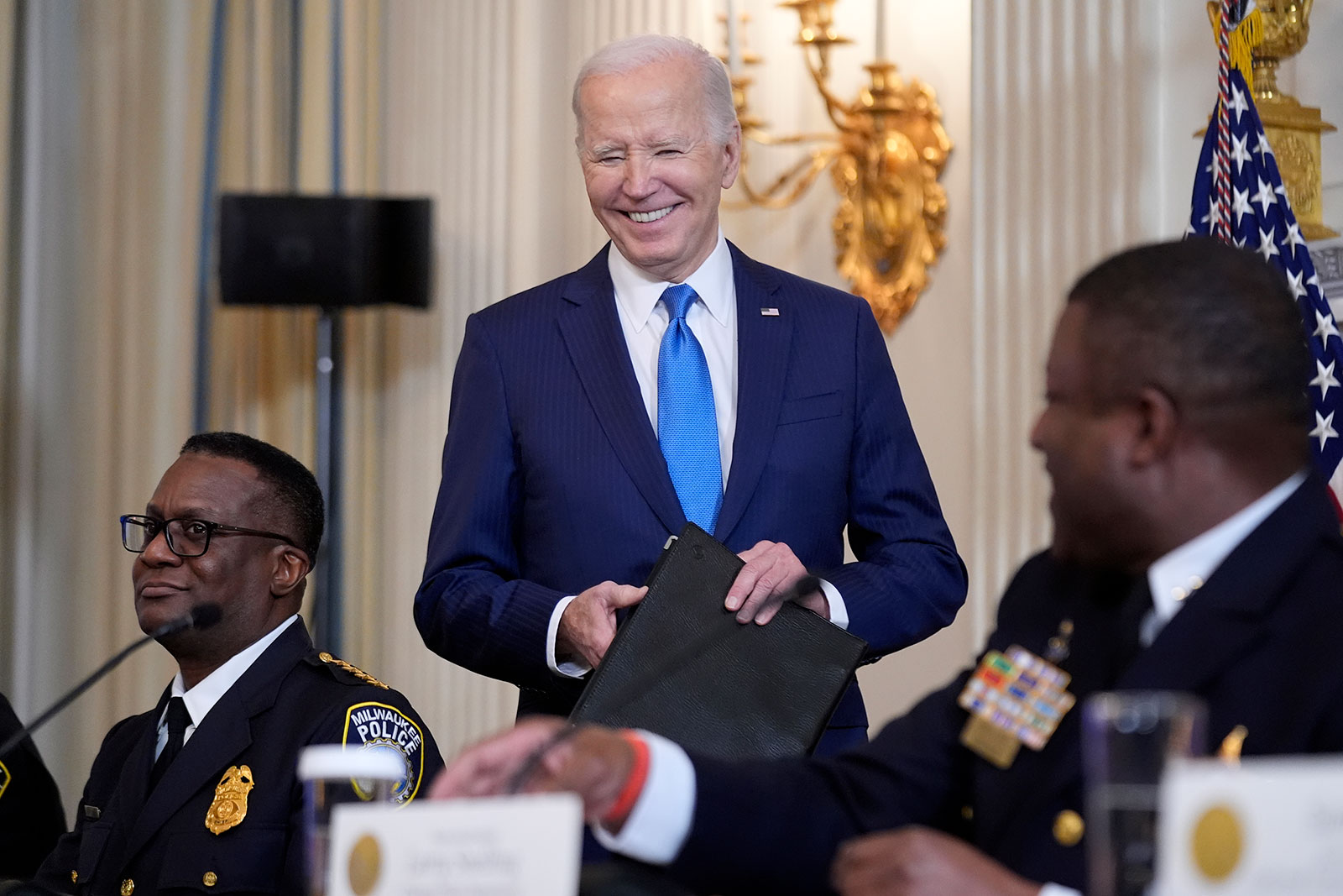 President Joe Biden smiles as he meets with law enforcement officials at the White House on Wednesday, February, 28. 