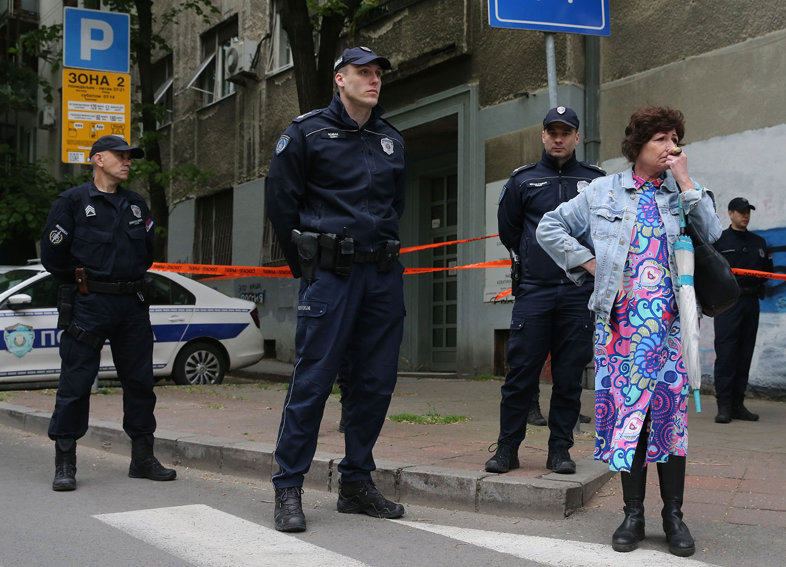 Police officers block a street near the Vladislav Ribnikar elementary school in Belgrade, Serbia, on May 3. 