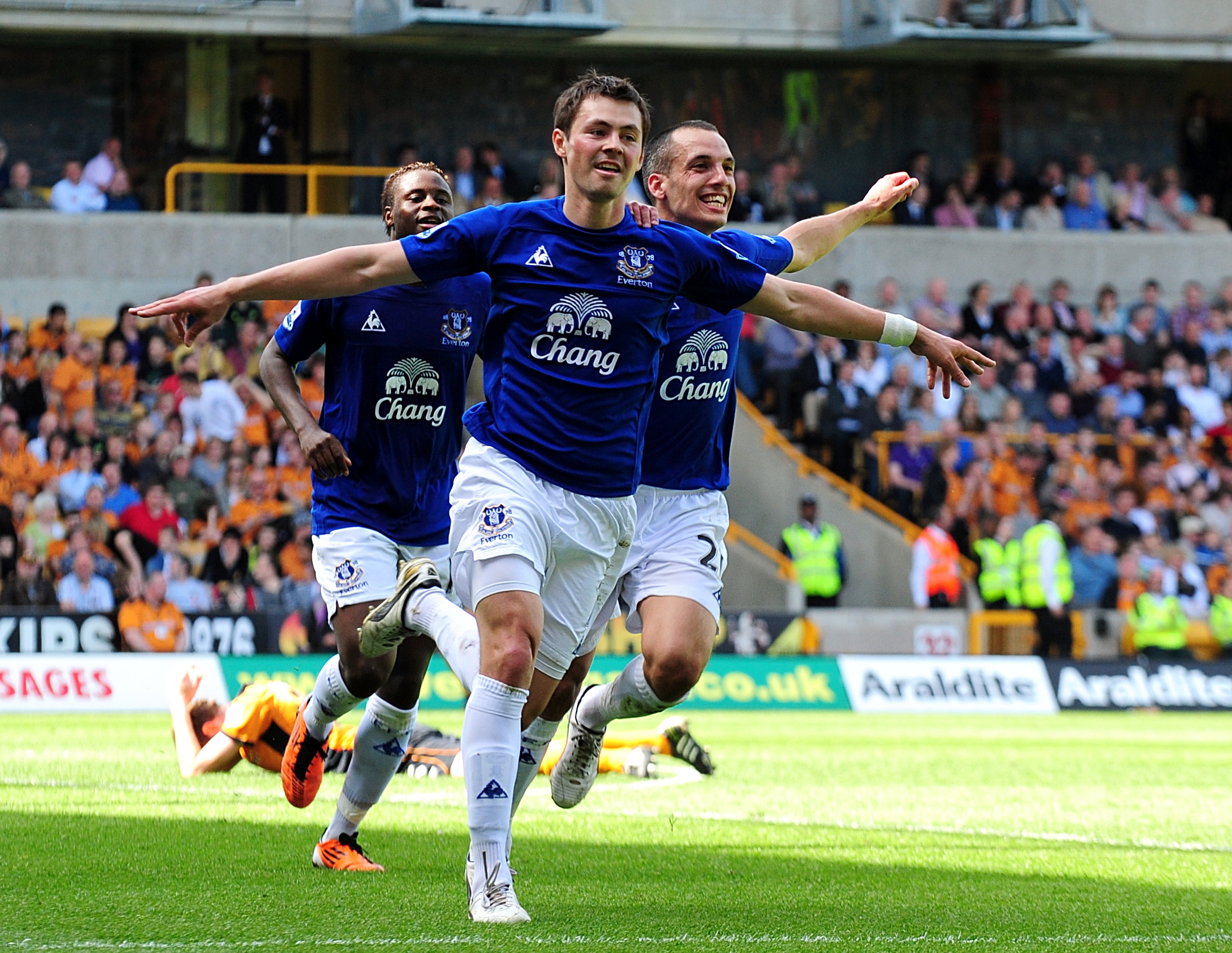Everton's Diniyar Bilyaletdinov, center, celebrates after scoring a goal on April 9, 2011. 