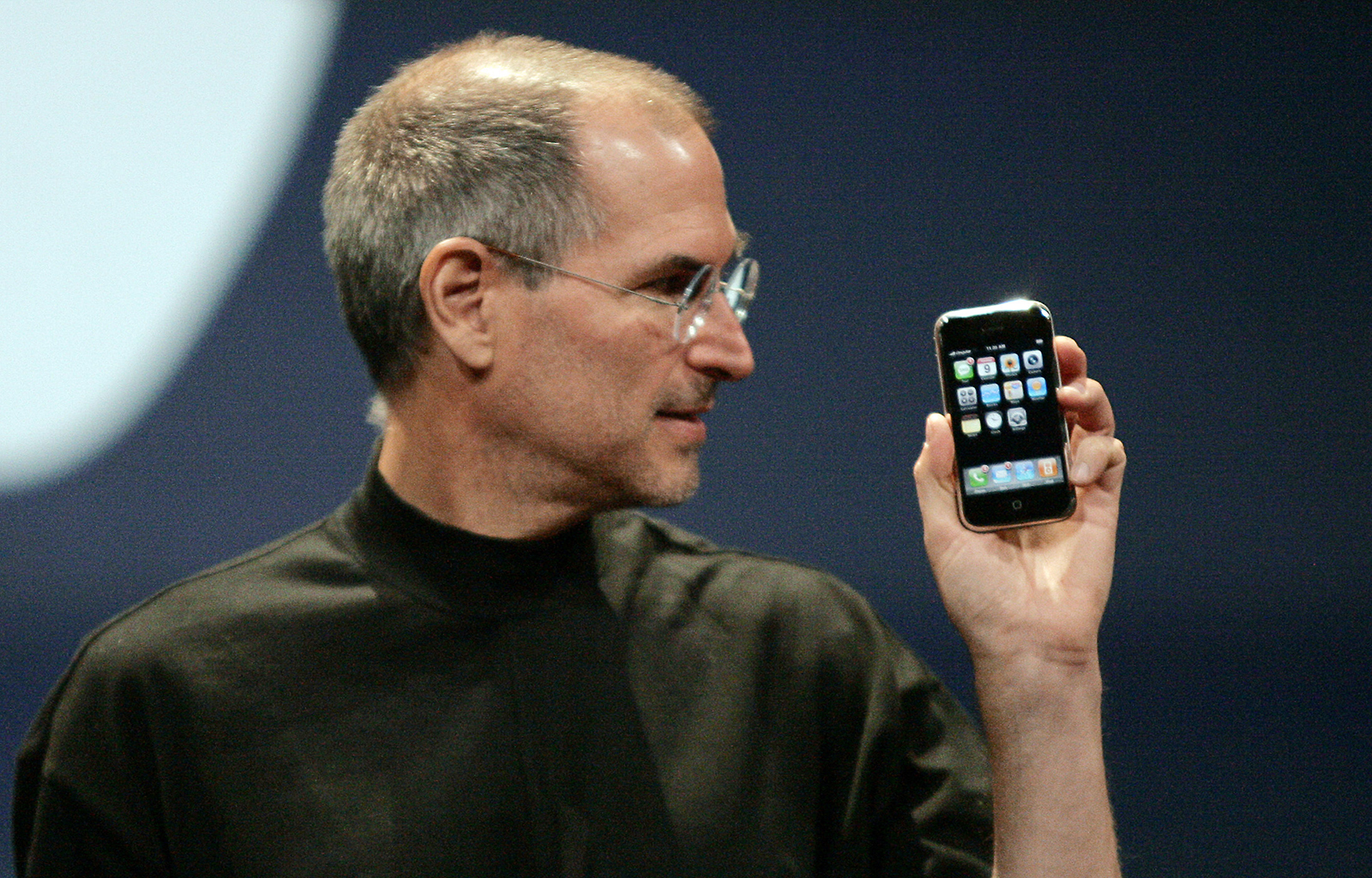 Steve Jobs holds the eagerly-anticipated iPhone in San Francisco, California, on January 9, 2007.