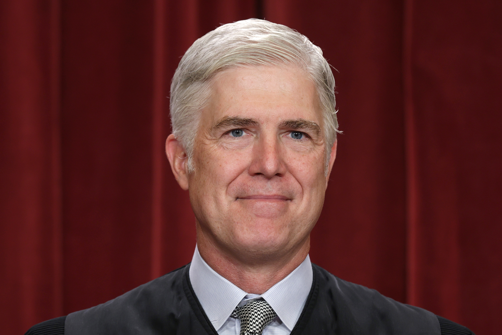 United States Supreme Court Associate Justice Neil Gorsuch poses for an official portrait at the East Conference Room of the Supreme Court building on October 7, 2022 in Washington, DC.