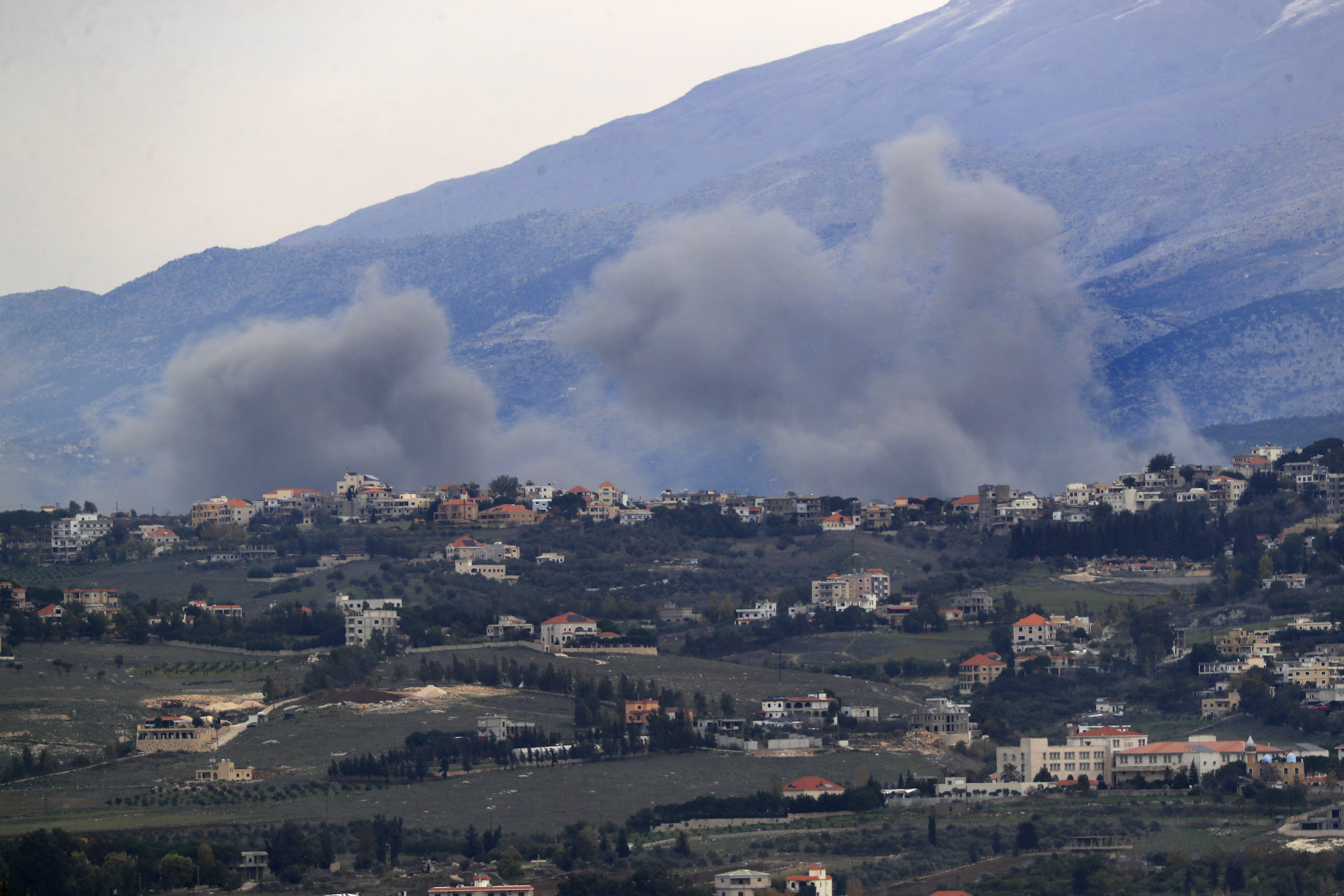 Smoke rises after Israeli airstrikes on the outskirts of Khiam, a town near the Lebanese-Israeli border, as seen from Marjayoun, south Lebanon, on December 21.