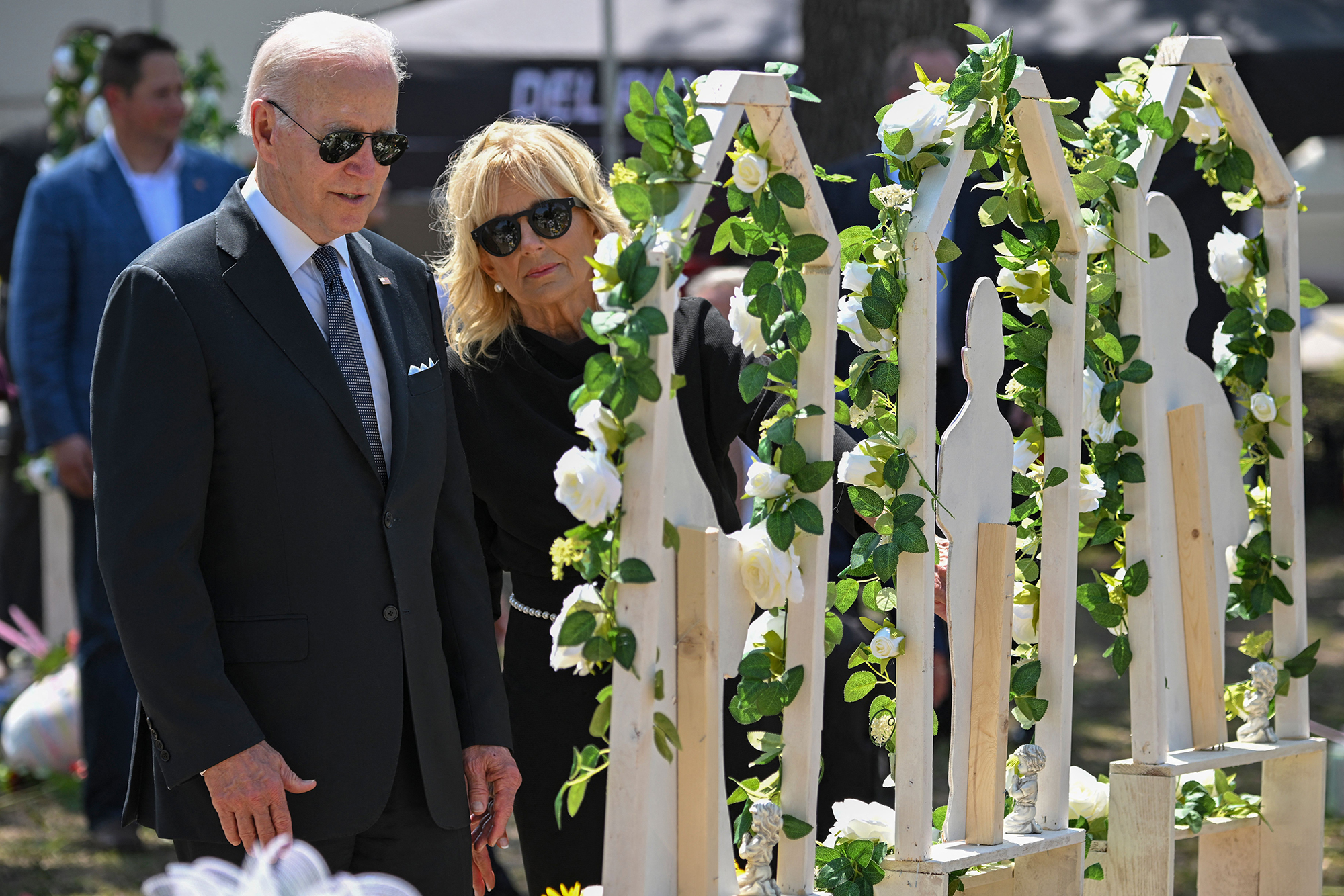 President Joe Biden and first lady Jill Biden pay their respects at a makeshift memorial outside Robb Elementary School in Uvalde, Texas on May 29. 