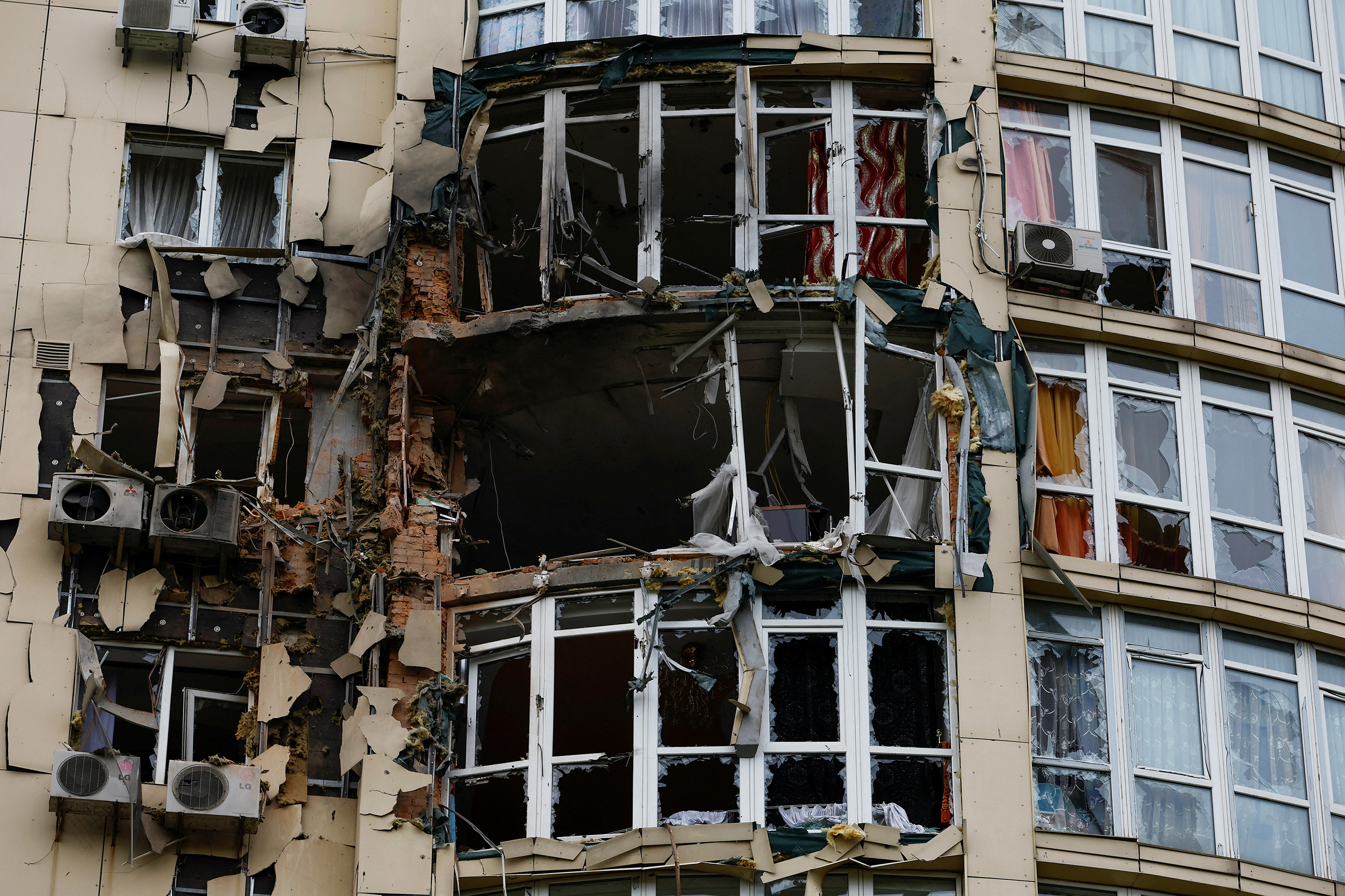 A view shows an apartment building damaged by remains of a suicide drone during a Russian overnight strike in Kyiv, Ukraine, on May 8.