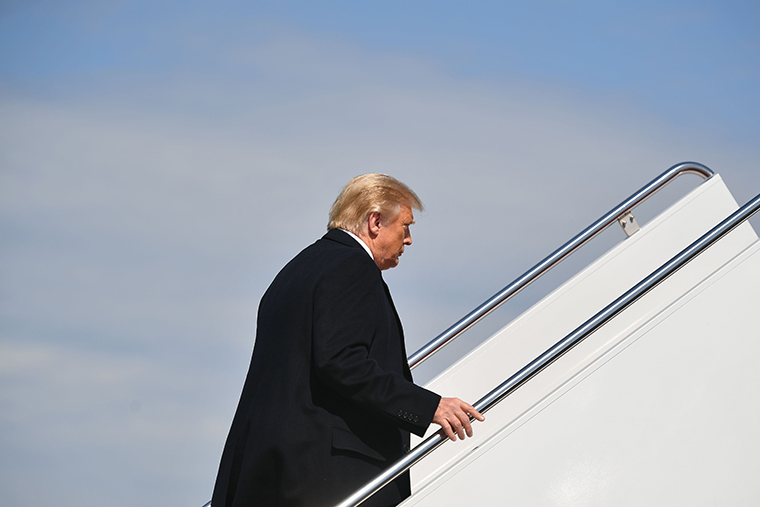 US President Donald Trump makes his way to board Air Force One before departing from Andrews Air Force Base in Maryland on October 1, 2020. 