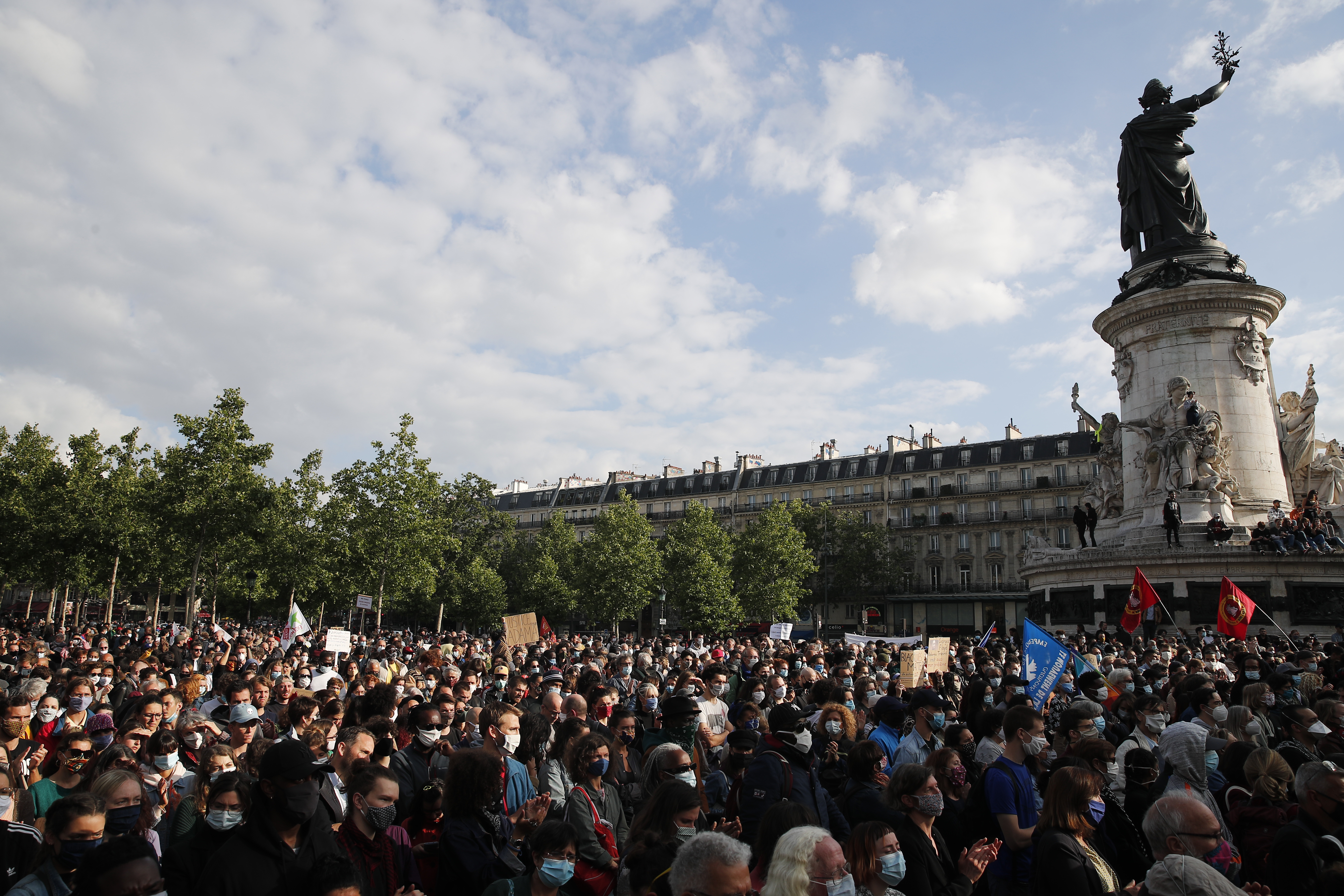 Demonstrators gather during a rally against racism June 9 on the Place de la Republique in Paris