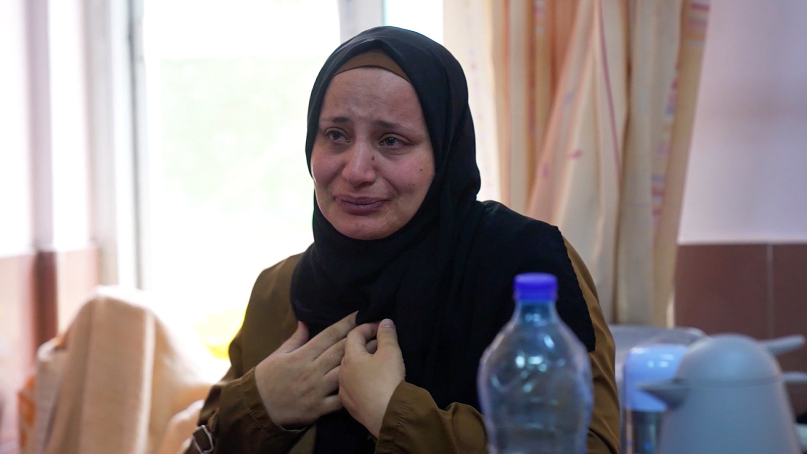 Nima Abu Garrara speaks to CNN in Jerusalem. She was brought from Rafah to East Jerusalem while pregnant with twins and gave birth on October 5.